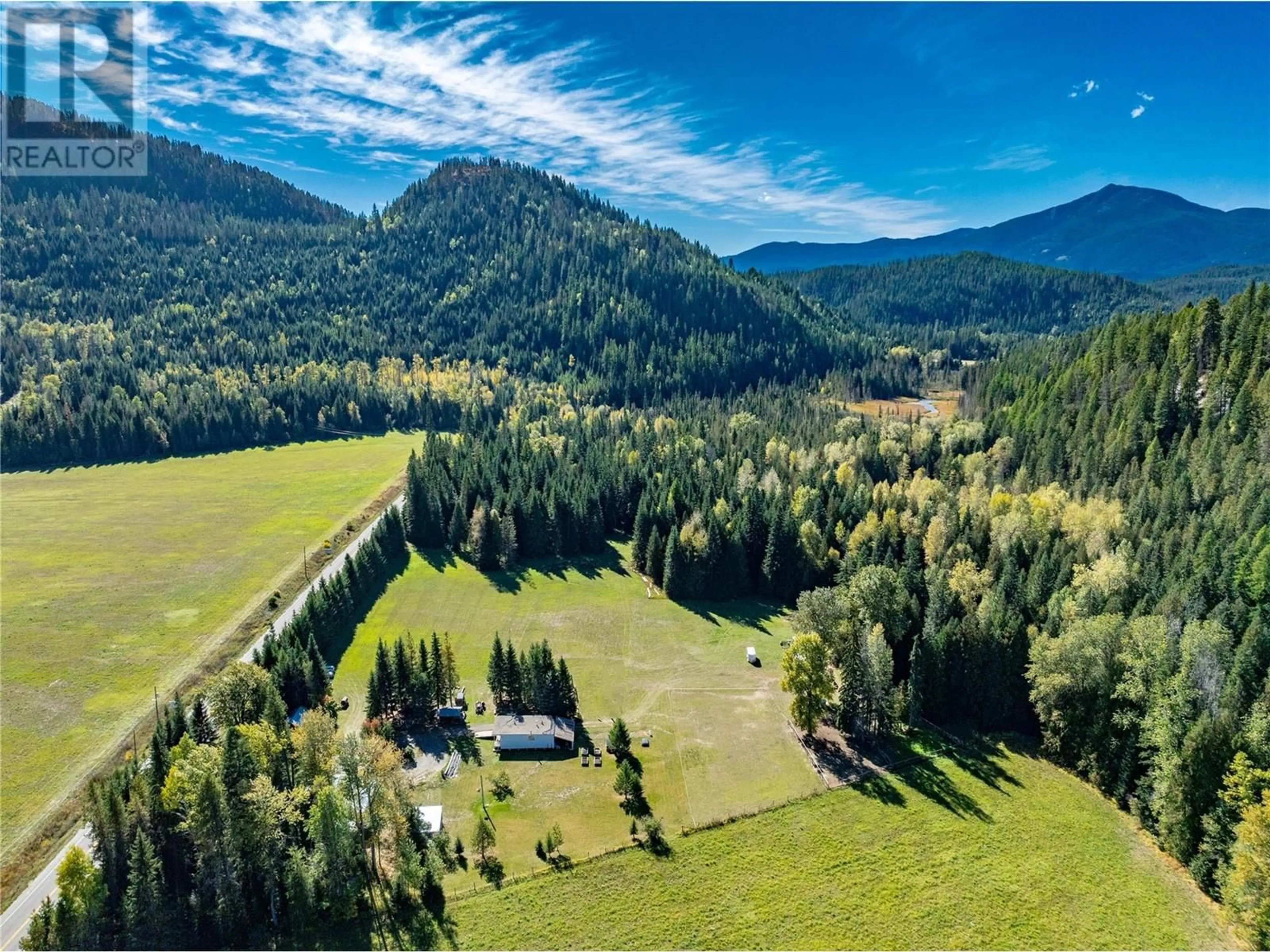 A pic from outside/outdoor area/front of a property/back of a property/a pic from drone, forest/trees view for 9848 6 HIGHWAY, Salmo British Columbia V0G1Z0