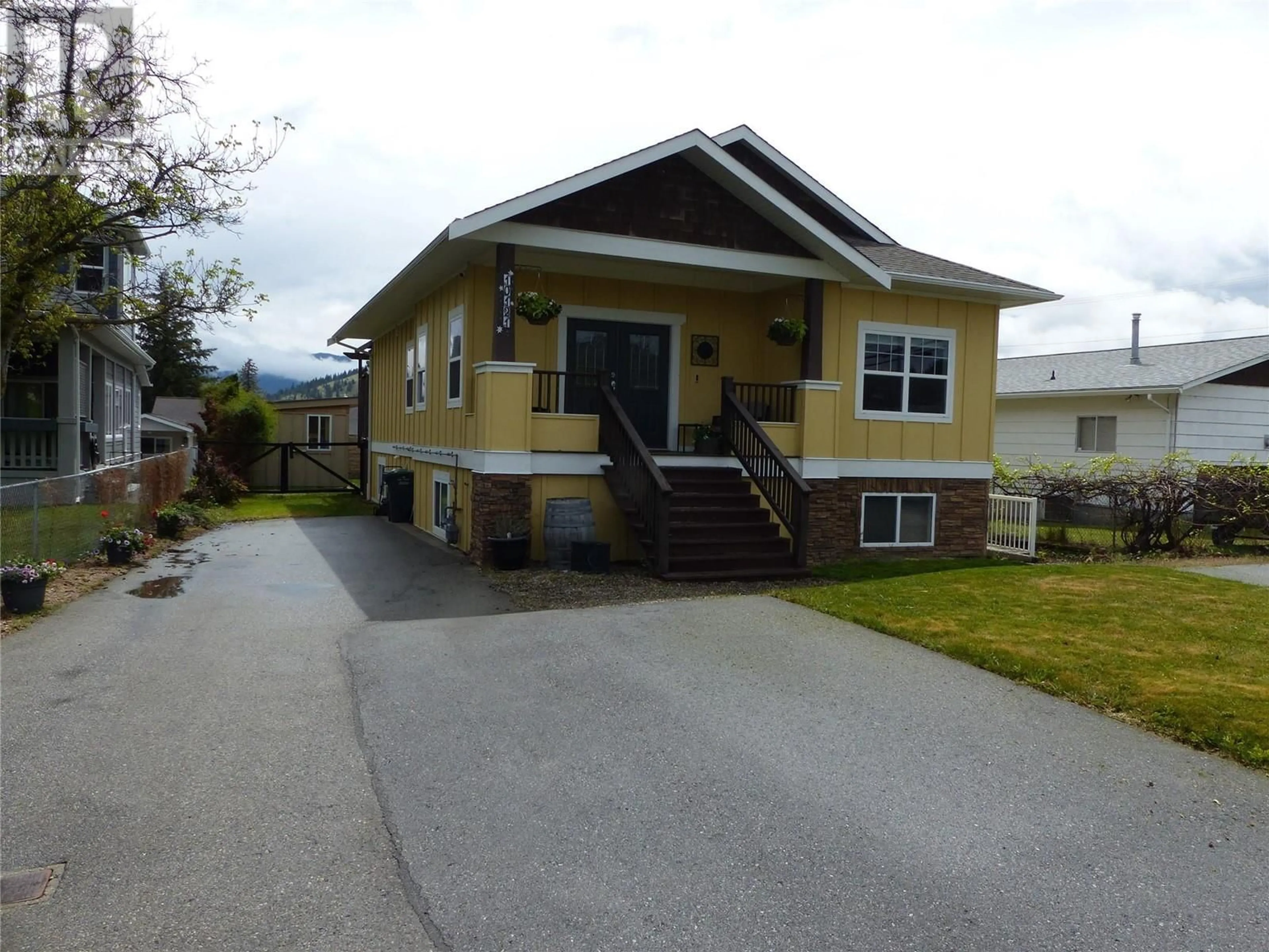 Home with vinyl exterior material, street for 100 - 10121 TURNER STREET, Summerland British Columbia V0H1Z5