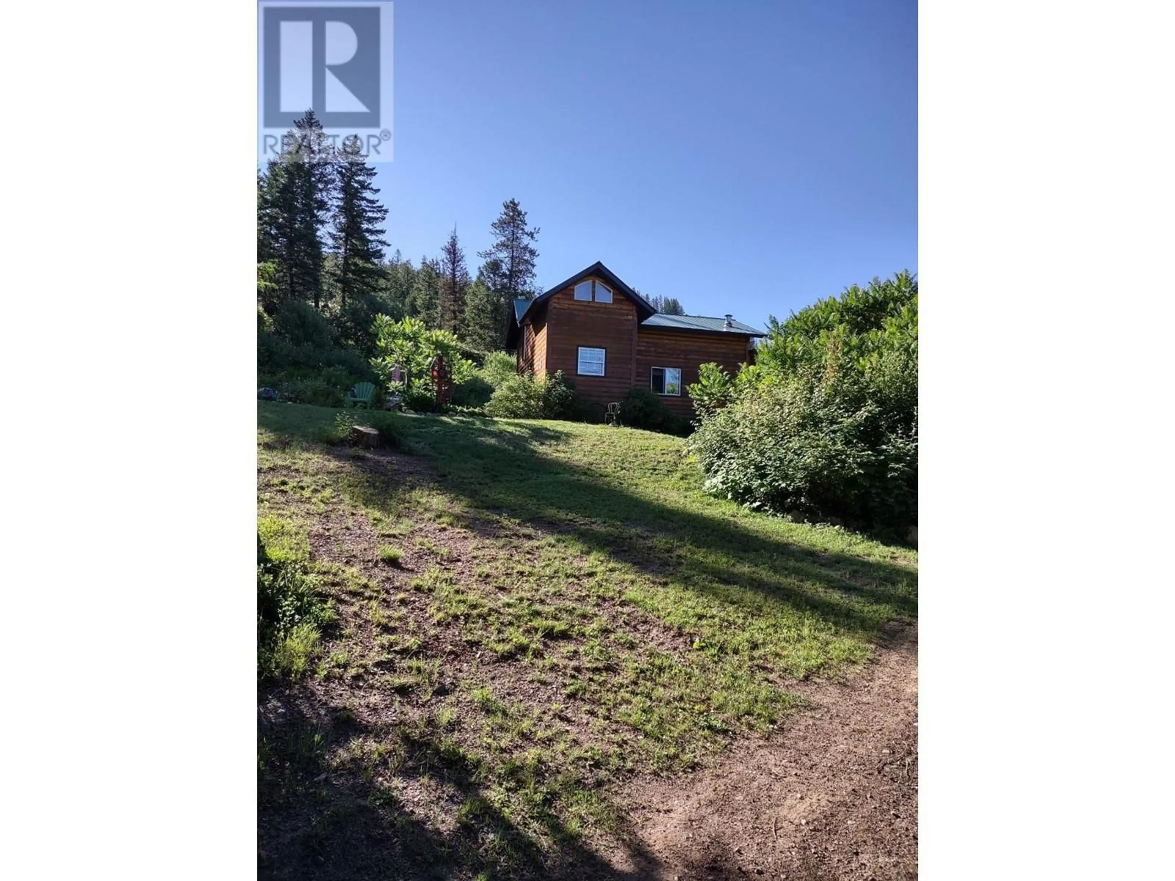 A pic from outside/outdoor area/front of a property/back of a property/a pic from drone, unknown for 9800 3 HIGHWAY, Grand Forks British Columbia V0H1H5