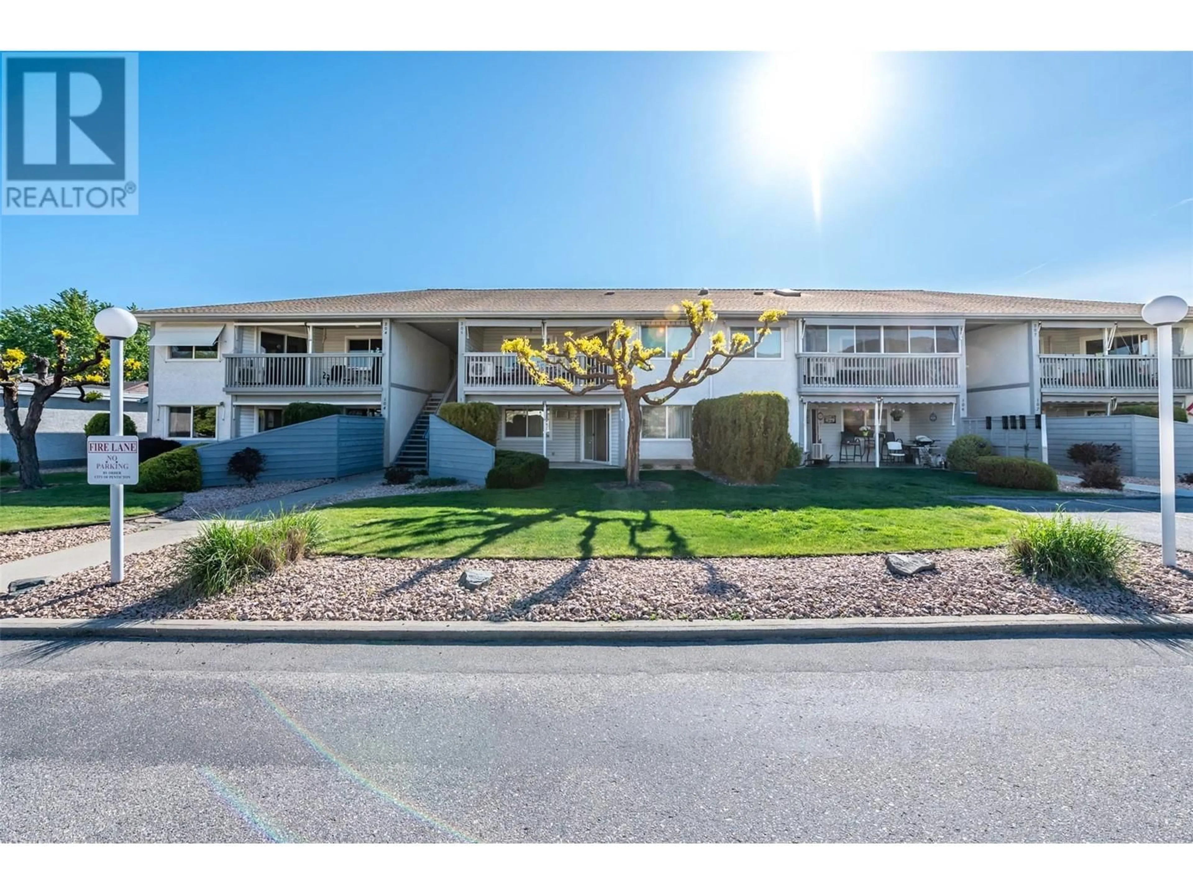 A pic from outside/outdoor area/front of a property/back of a property/a pic from drone, unknown for 105 - 232 KINNEY AVENUE, Penticton British Columbia V2A3N9