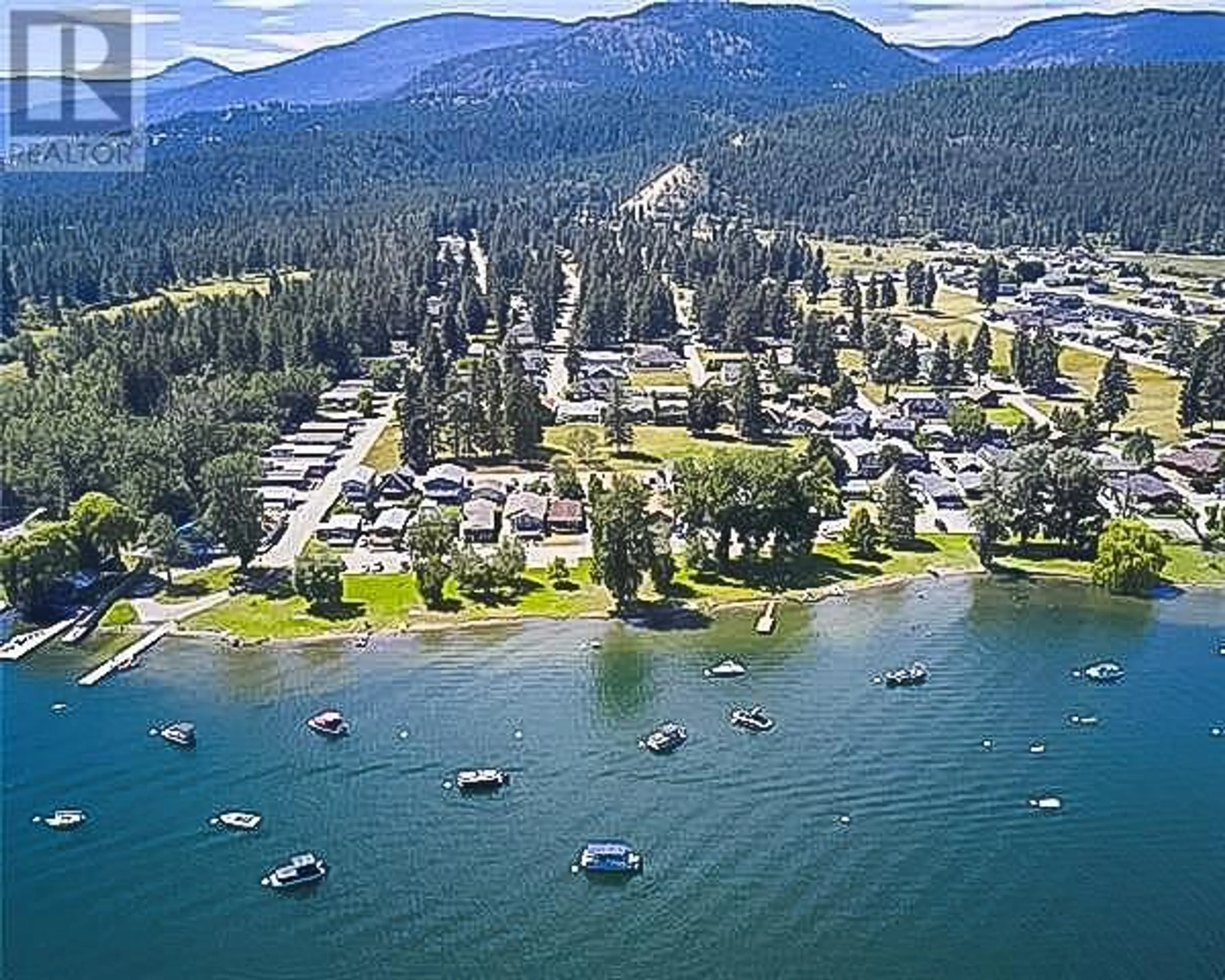 A pic from outside/outdoor area/front of a property/back of a property/a pic from drone, water/lake/river/ocean view for 42 LAKESHORE DRIVE, Vernon British Columbia V1H2A1