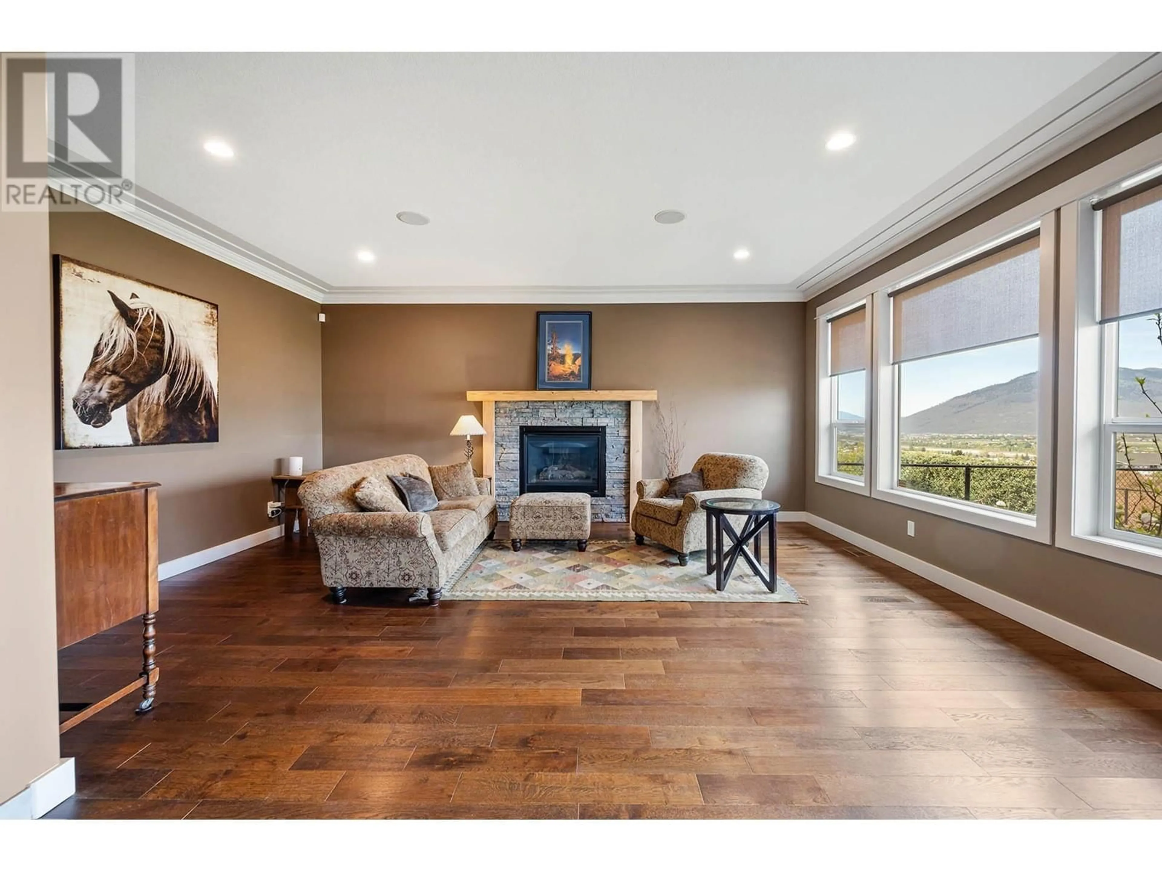 Living room with furniture, wood/laminate floor for 341 FERNIE PLACE, Kamloops British Columbia V2C6S4