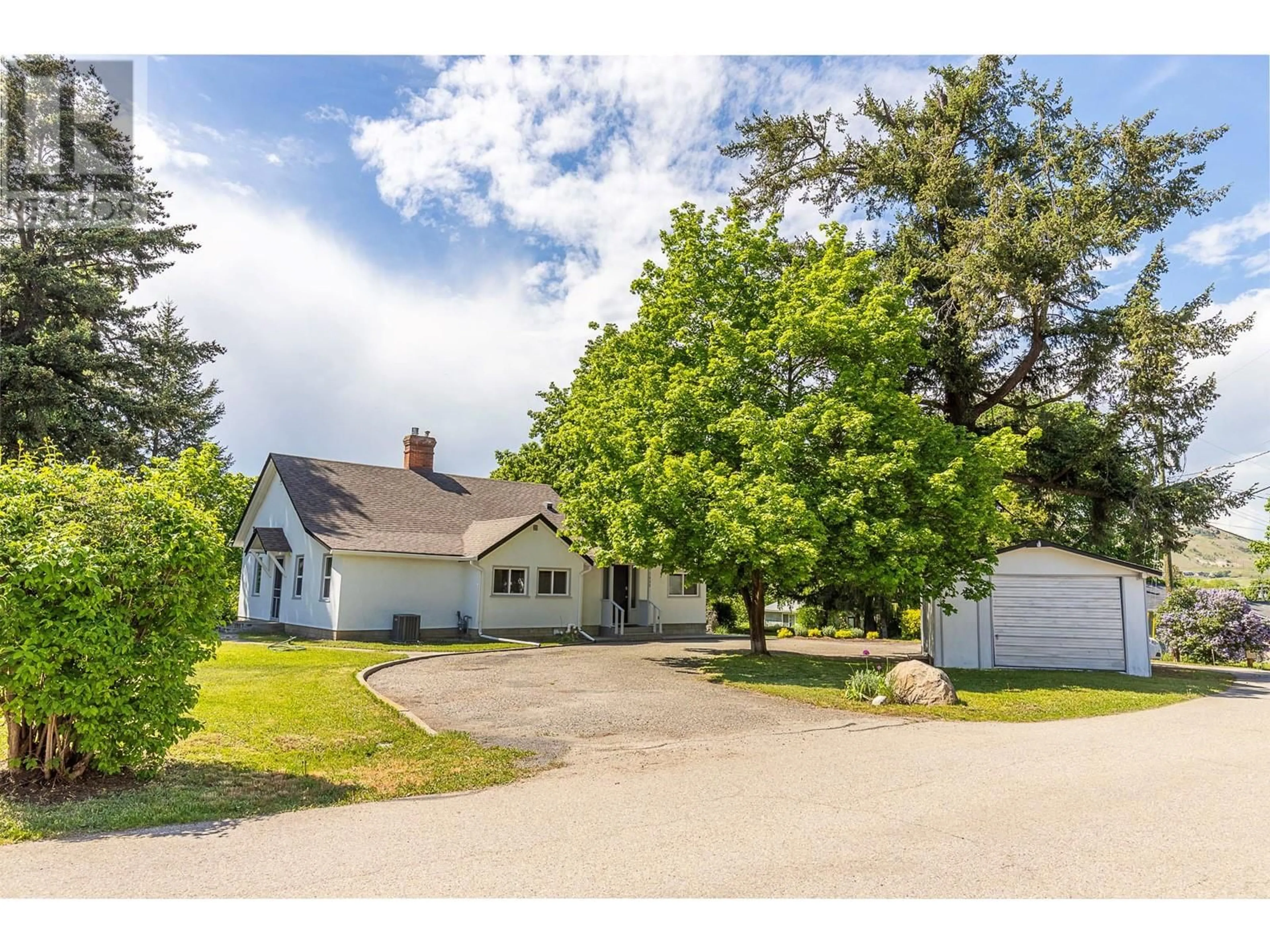 A pic from outside/outdoor area/front of a property/back of a property/a pic from drone, street for 7800 DE JONG DRIVE, Coldstream British Columbia V1B1P3