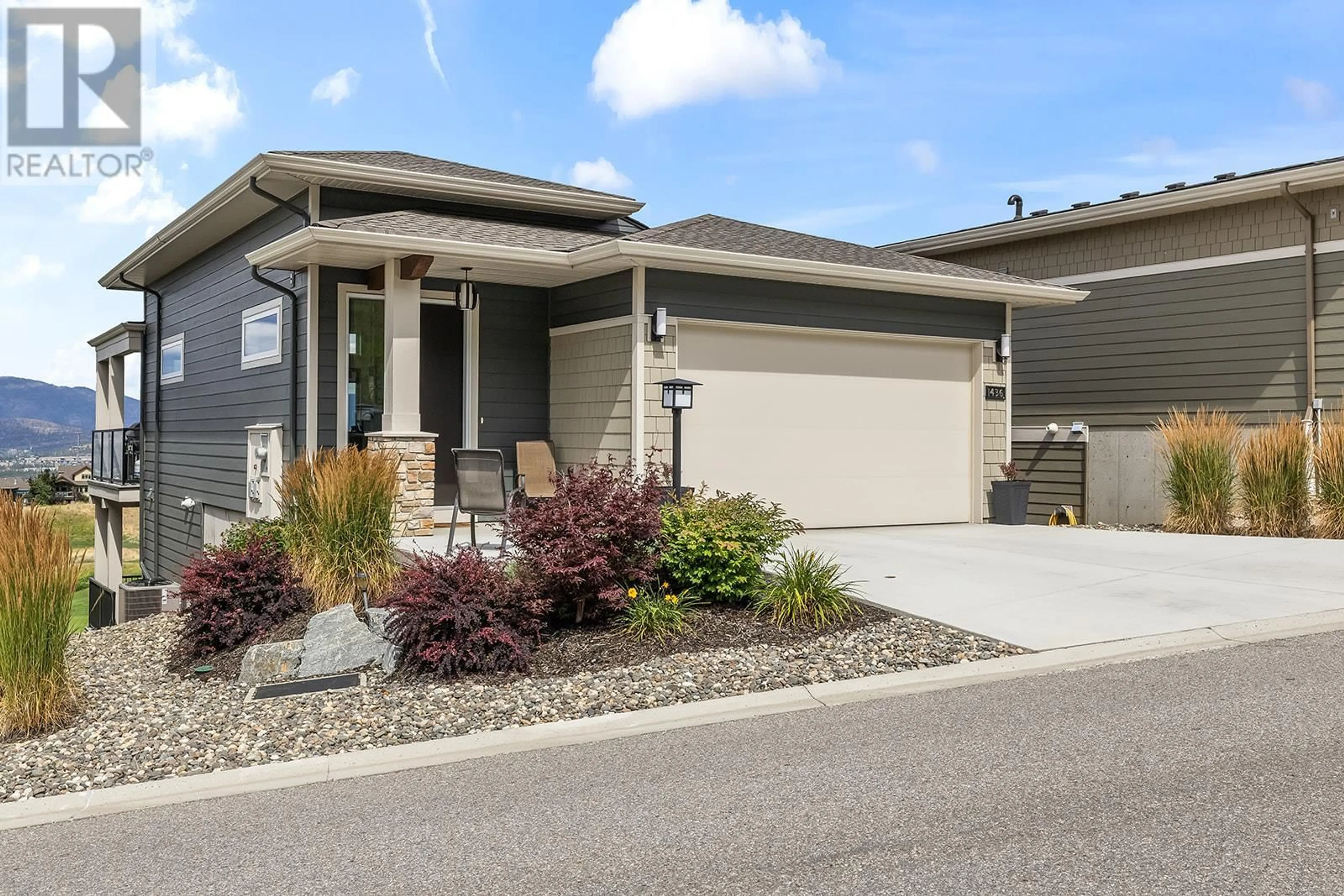 Home with vinyl exterior material, street for 1436 TOWER RANCH DRIVE, Kelowna British Columbia V1P1T8