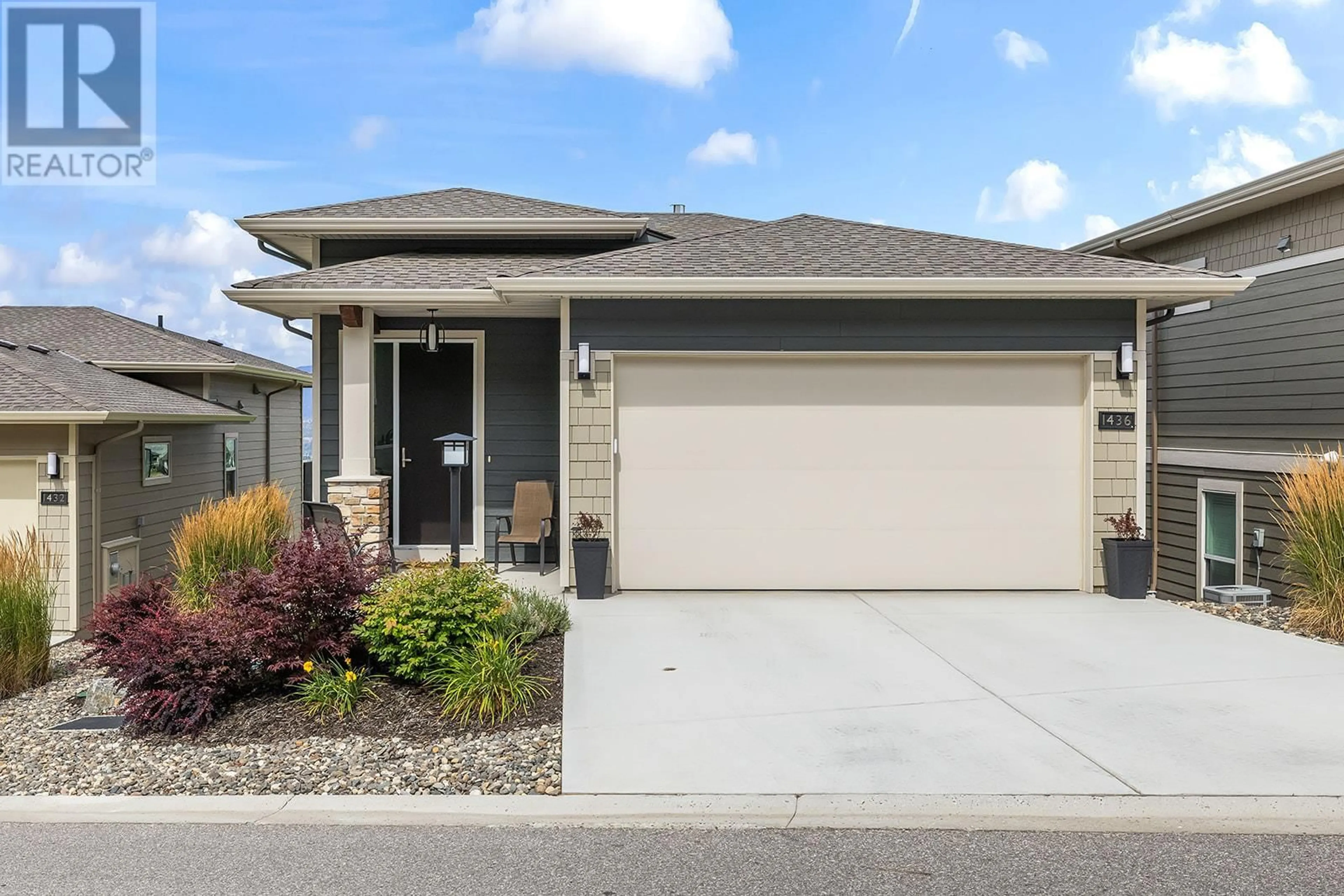 Home with vinyl exterior material, street for 1436 TOWER RANCH DRIVE, Kelowna British Columbia V1P1T8
