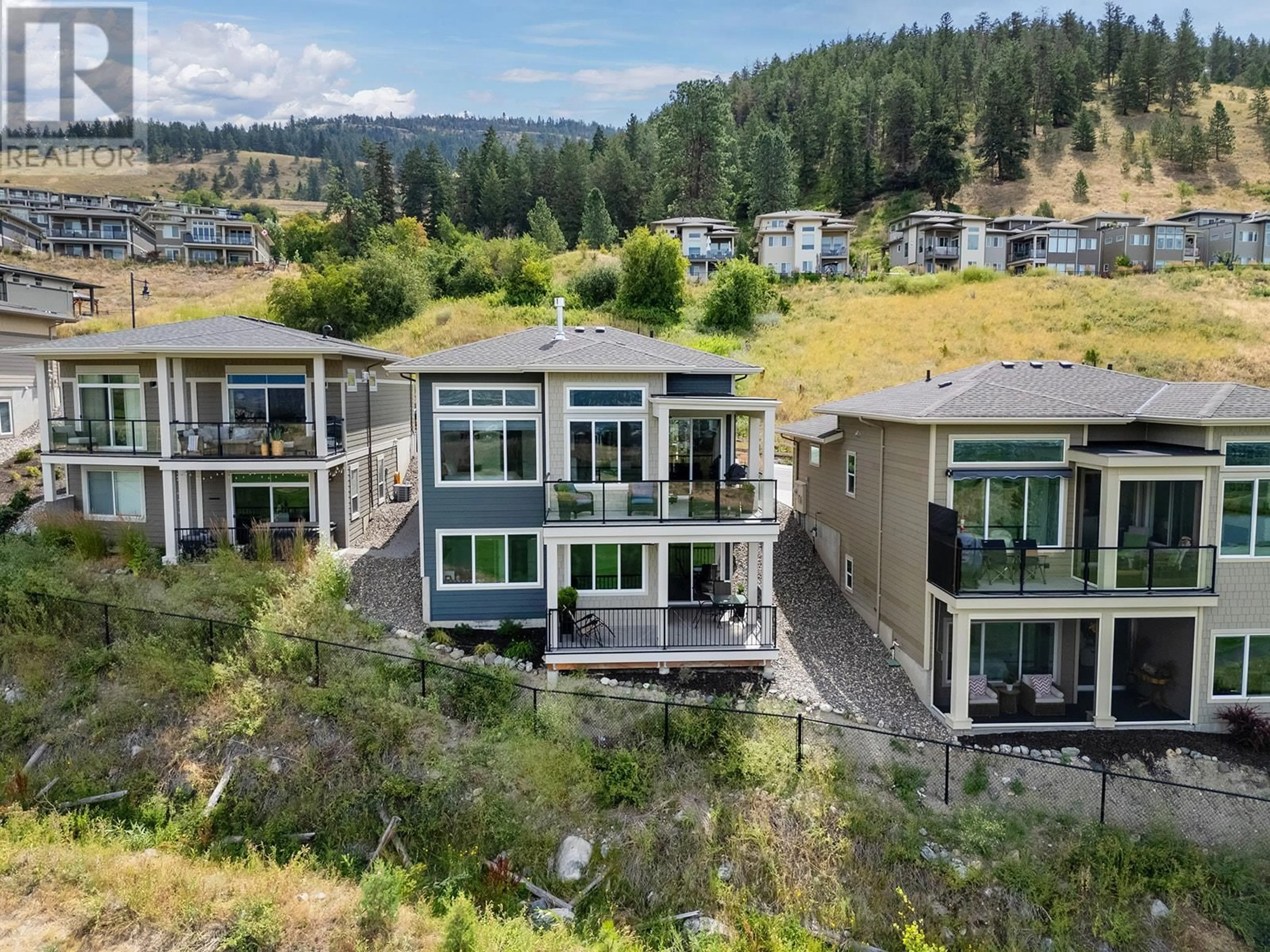A pic from outside/outdoor area/front of a property/back of a property/a pic from drone, unknown for 1436 TOWER RANCH DRIVE, Kelowna British Columbia V1P1T8