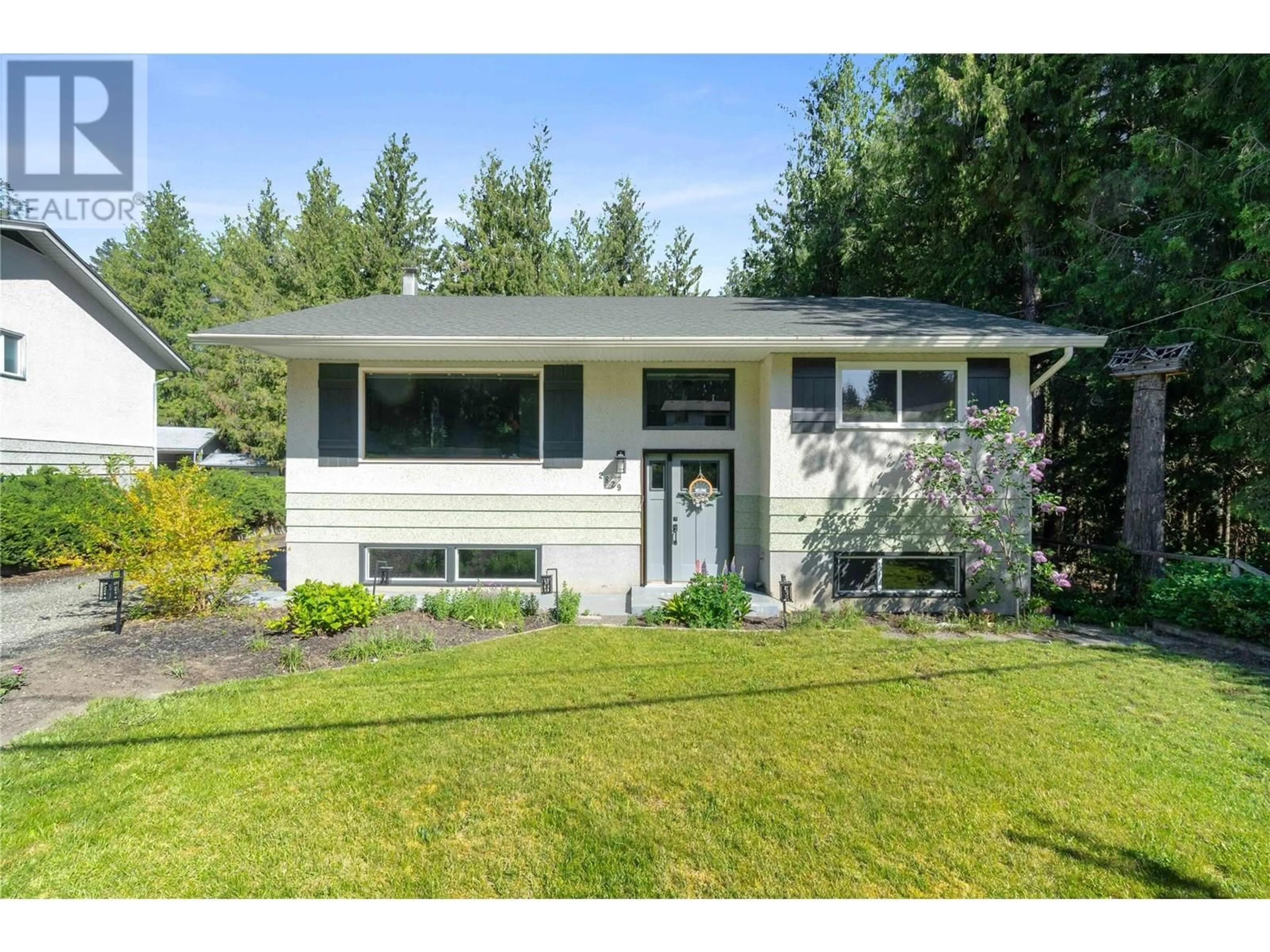 Home with vinyl exterior material, street for 2829 CAEN ROAD, Sorrento British Columbia V0E2W0