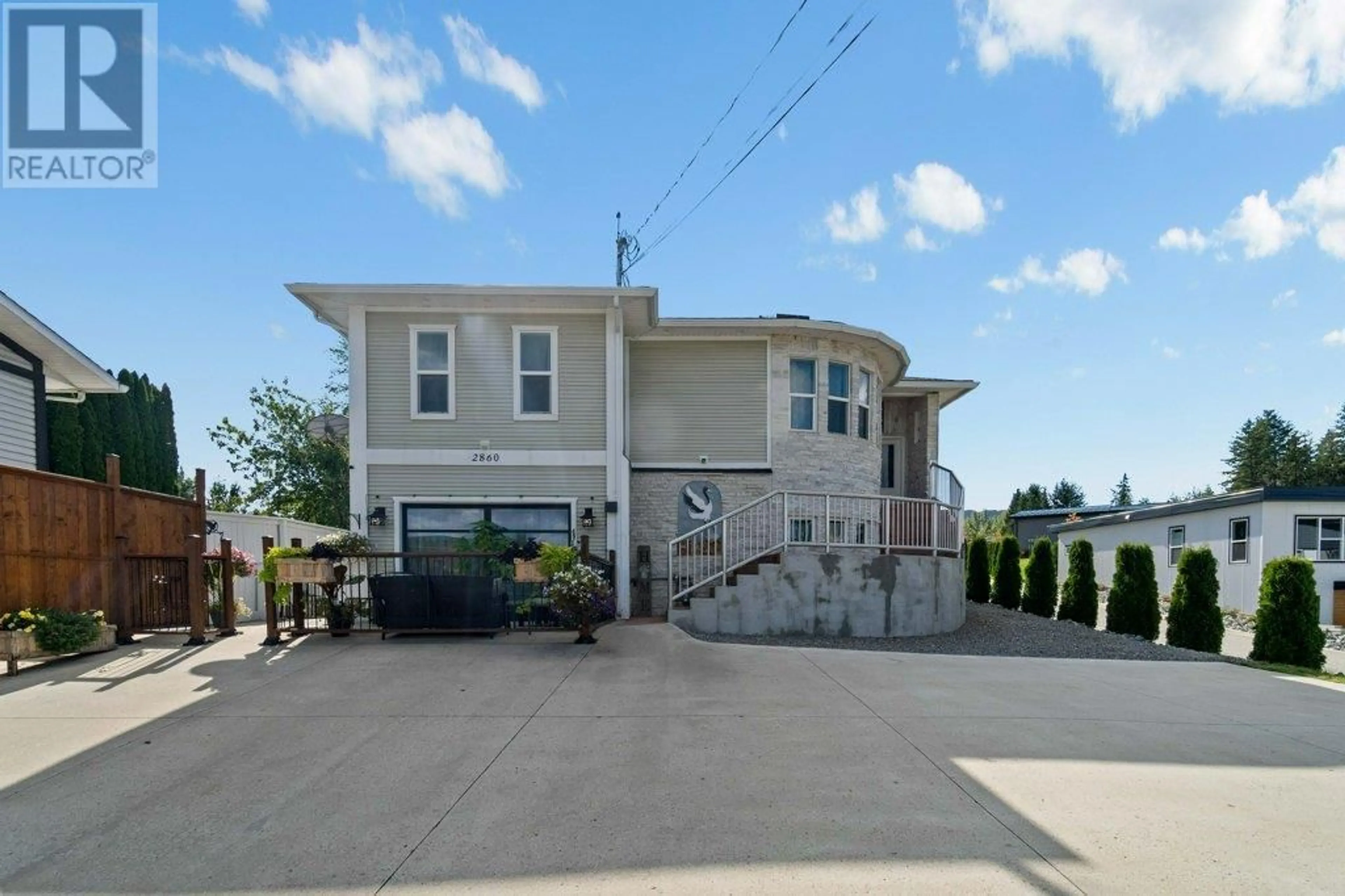 Home with vinyl exterior material, street for 2860 15 AVENUE NORTHEAST, Salmon Arm British Columbia V1E2B6