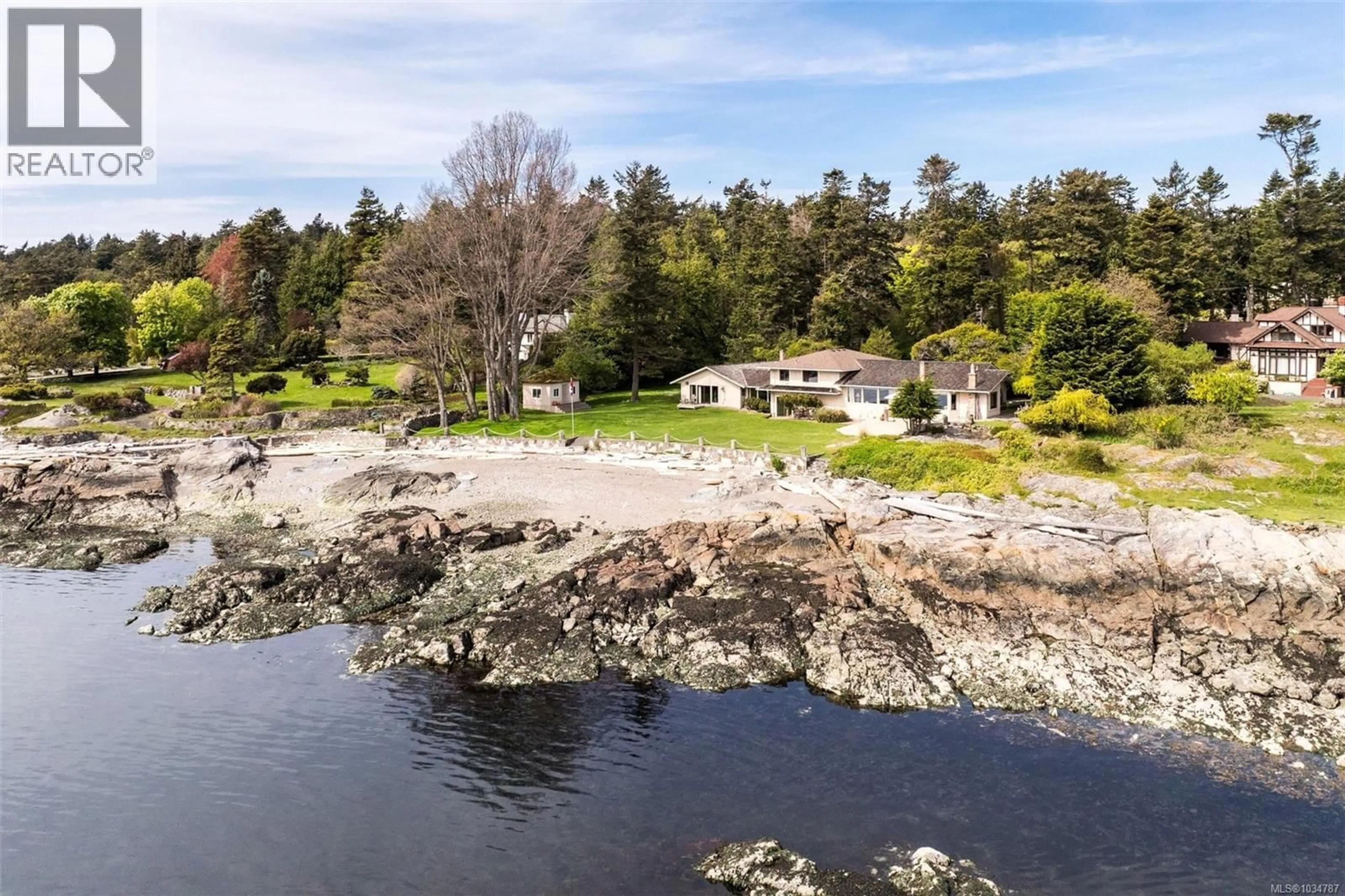A pic from outside/outdoor area/front of a property/back of a property/a pic from drone, water/lake/river/ocean view for 3035 MCANALLY ROAD, Saanich British Columbia V8N4L3