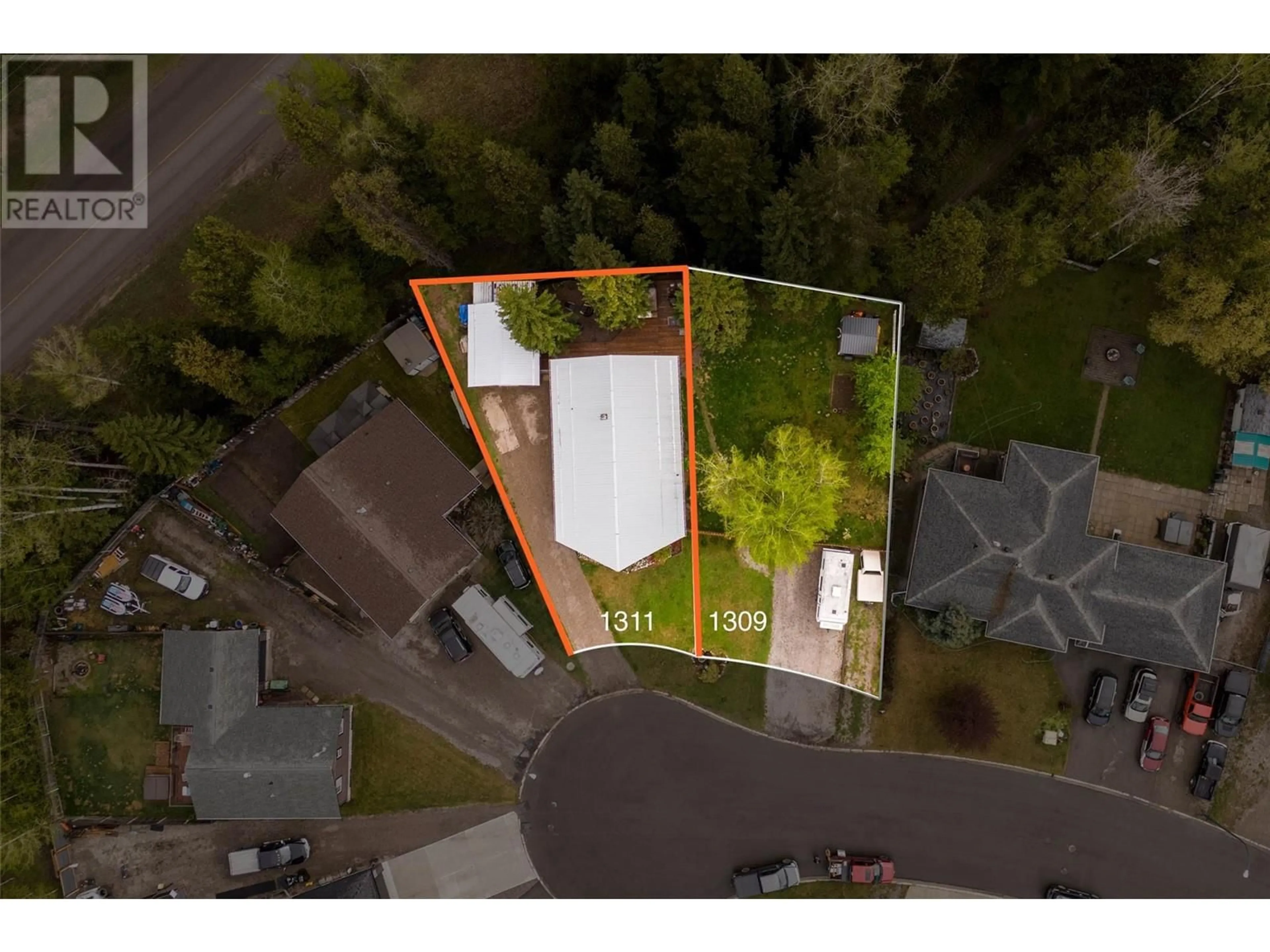 A pic from outside/outdoor area/front of a property/back of a property/a pic from drone, street for 1311 CYPRESS PLACE, Sparwood British Columbia V0B2G2