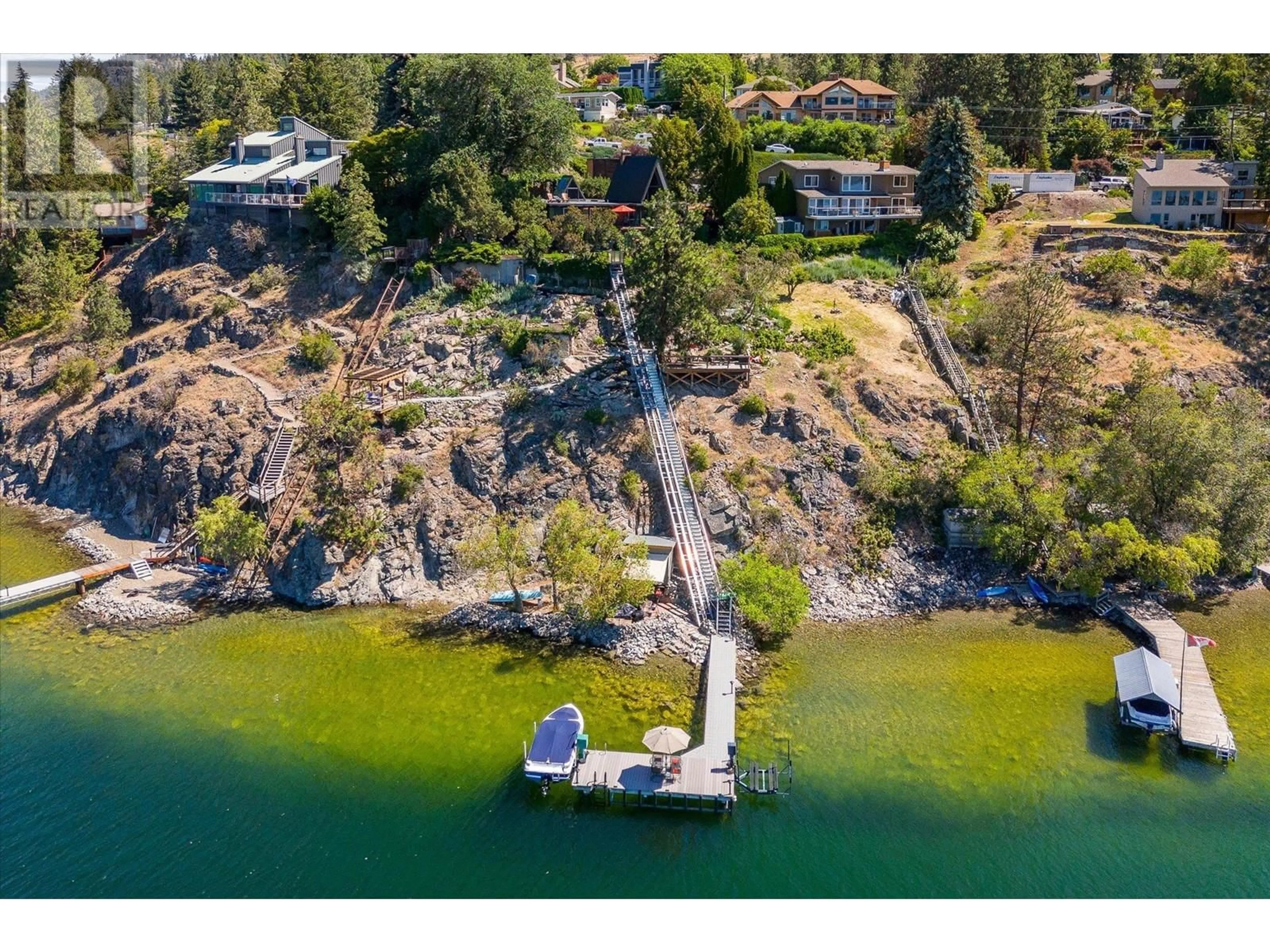 A pic from outside/outdoor area/front of a property/back of a property/a pic from drone, water/lake/river/ocean view for 2004 DEWDNEY ROAD, Kelowna British Columbia V1V2C3