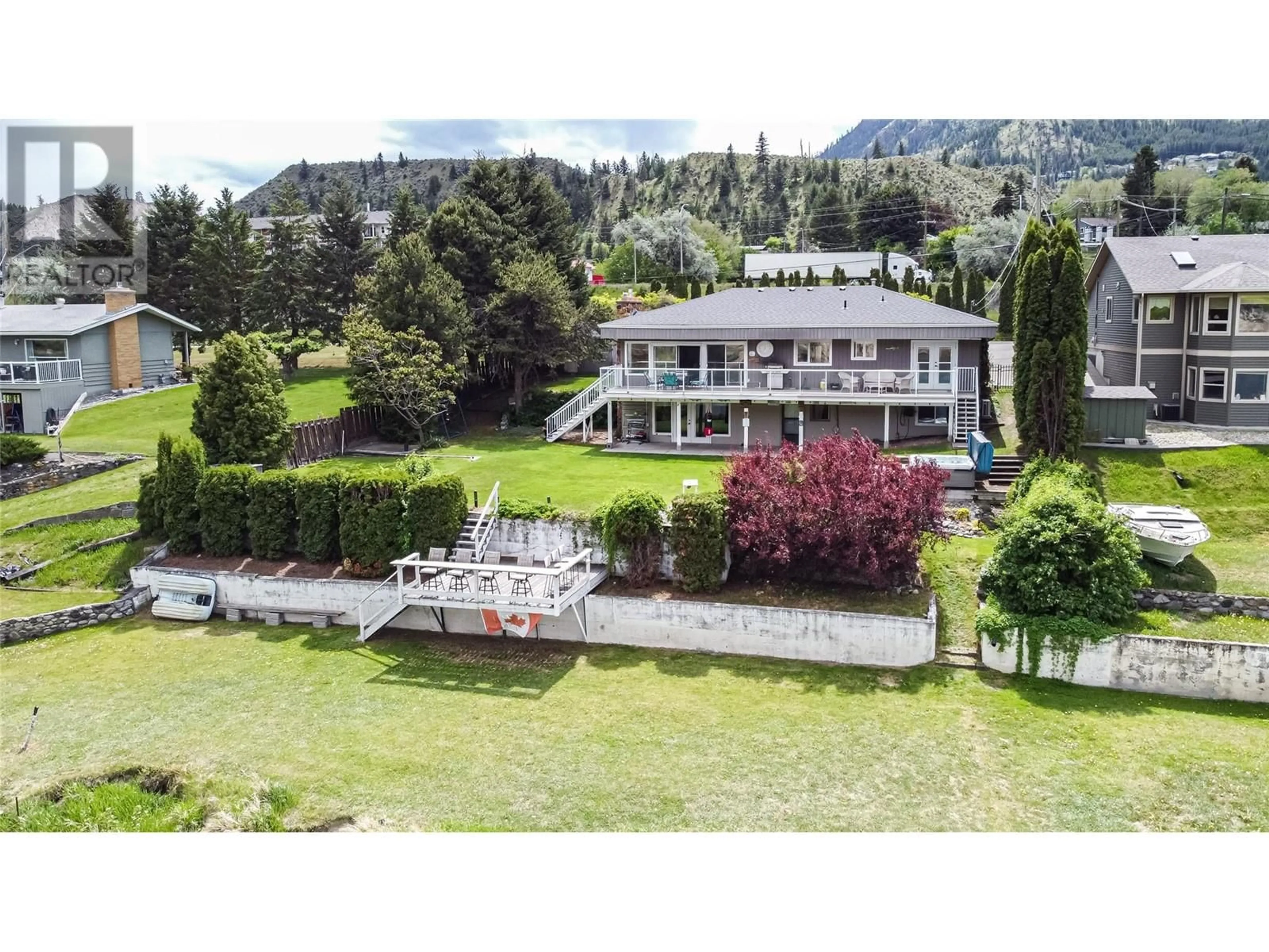 A pic from outside/outdoor area/front of a property/back of a property/a pic from drone, mountain view for 5050 KIPP ROAD, Kamloops British Columbia V2H1T7