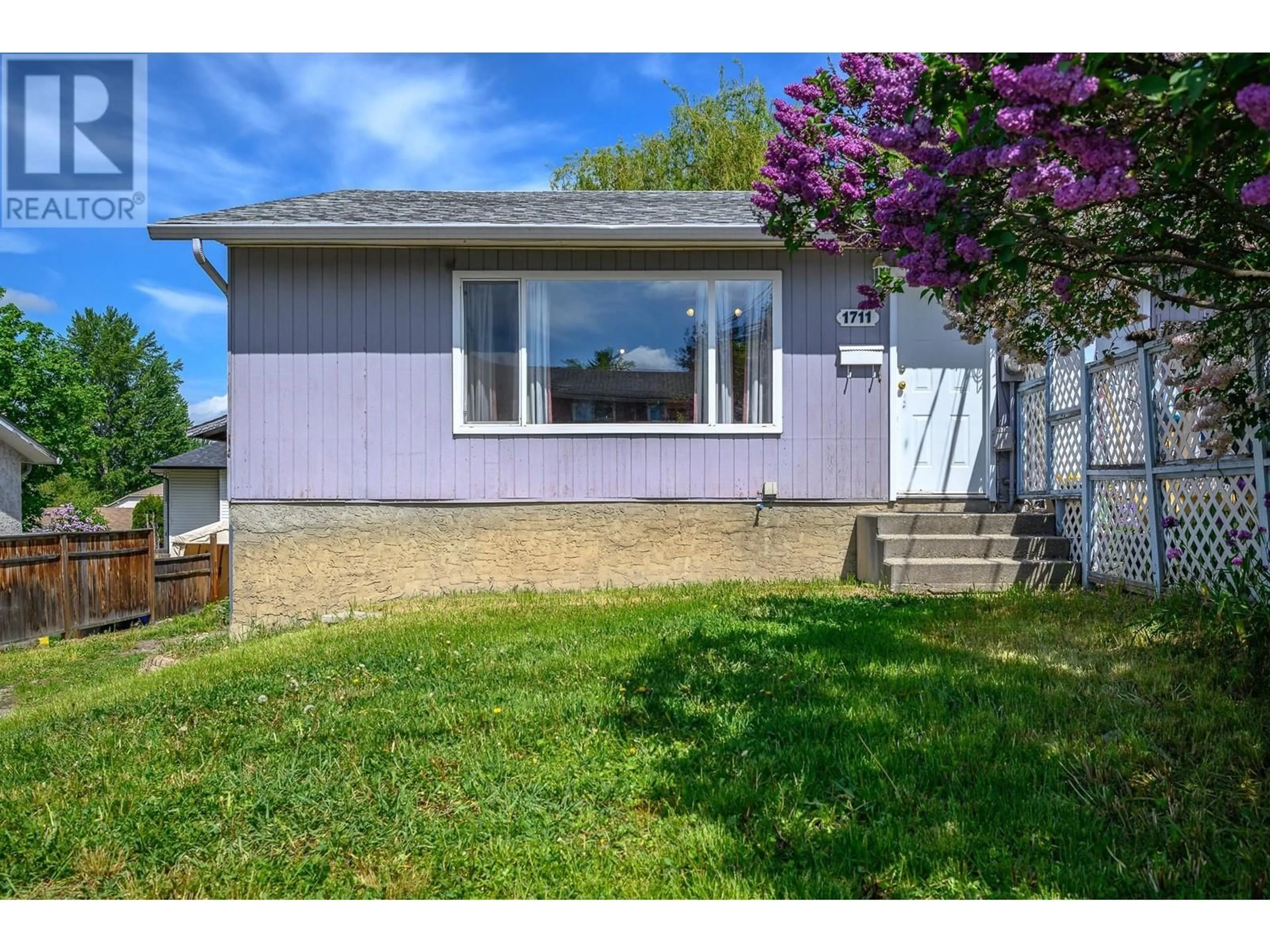 Home with vinyl exterior material, street for 1711 41 AVENUE, Vernon British Columbia V1T7M8