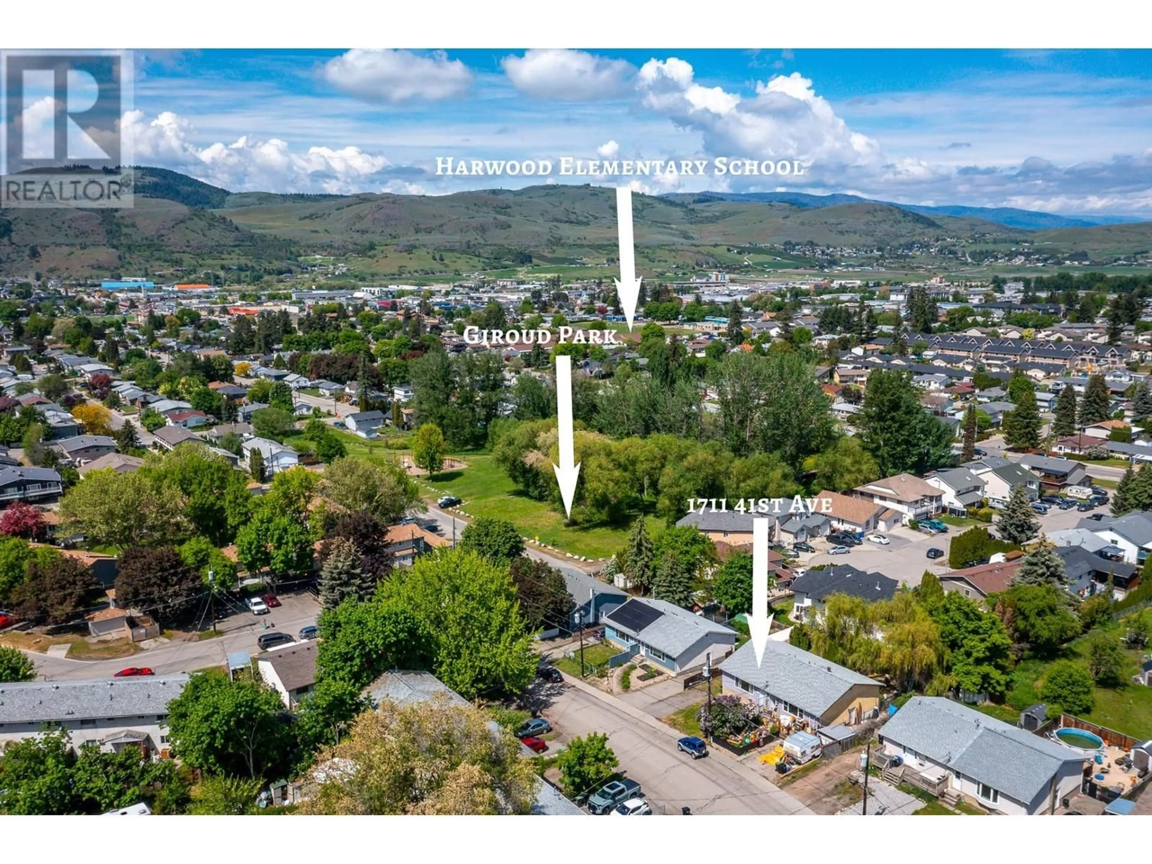 A pic from outside/outdoor area/front of a property/back of a property/a pic from drone, mountain view for 1711 41 AVENUE, Vernon British Columbia V1T7M8