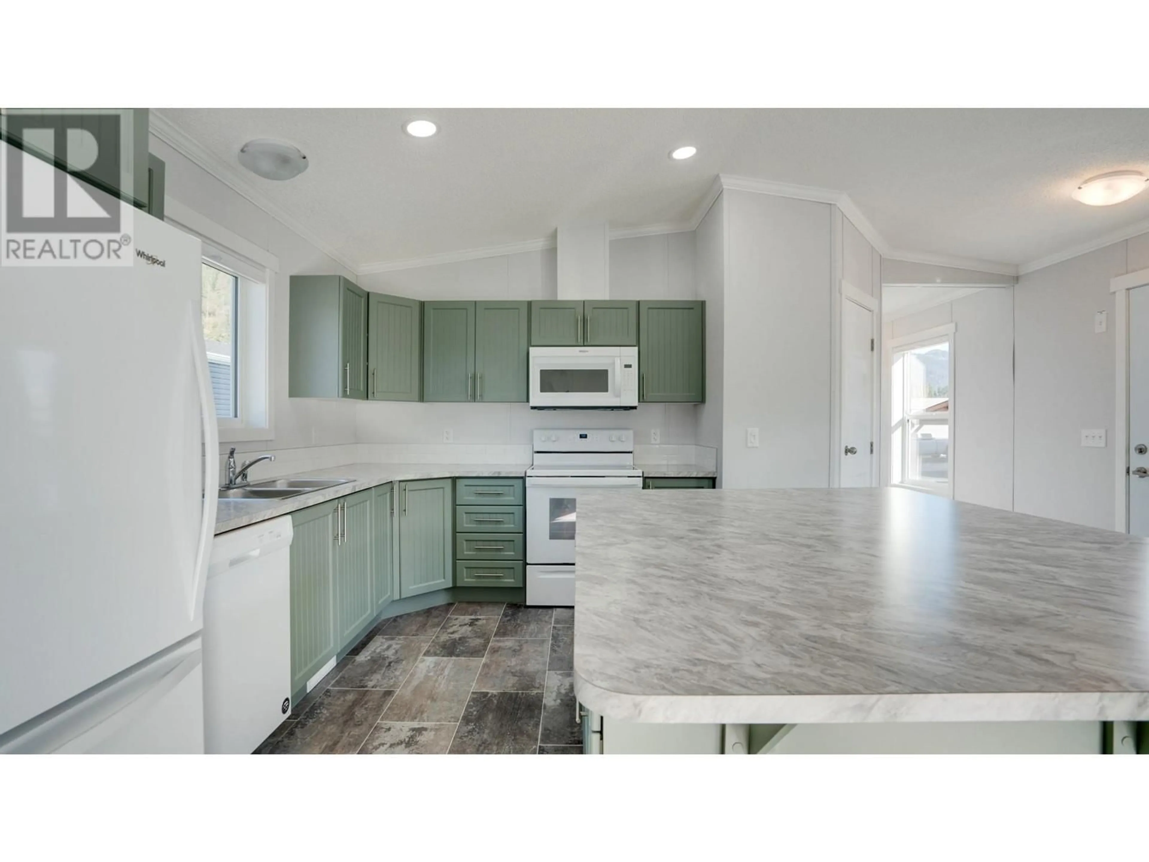 Open concept kitchen, ceramic/tile floor for 23 - 1705 HILLIER ROAD EAST, Sicamous British Columbia V0E2V4