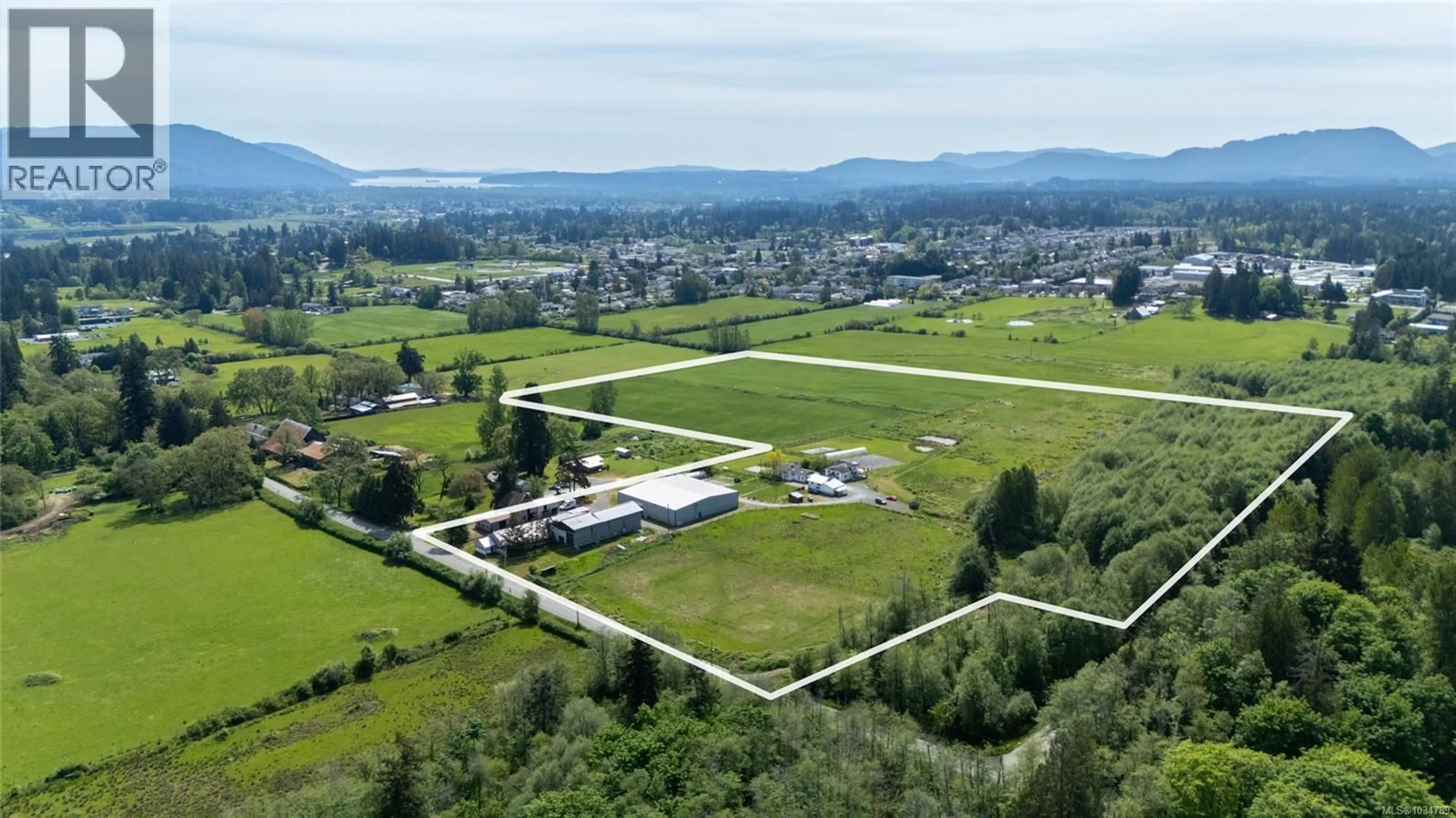 A pic from outside/outdoor area/front of a property/back of a property/a pic from drone, mountain view for 3504 DRINKWATER ROAD, Duncan British Columbia V9L5Z2