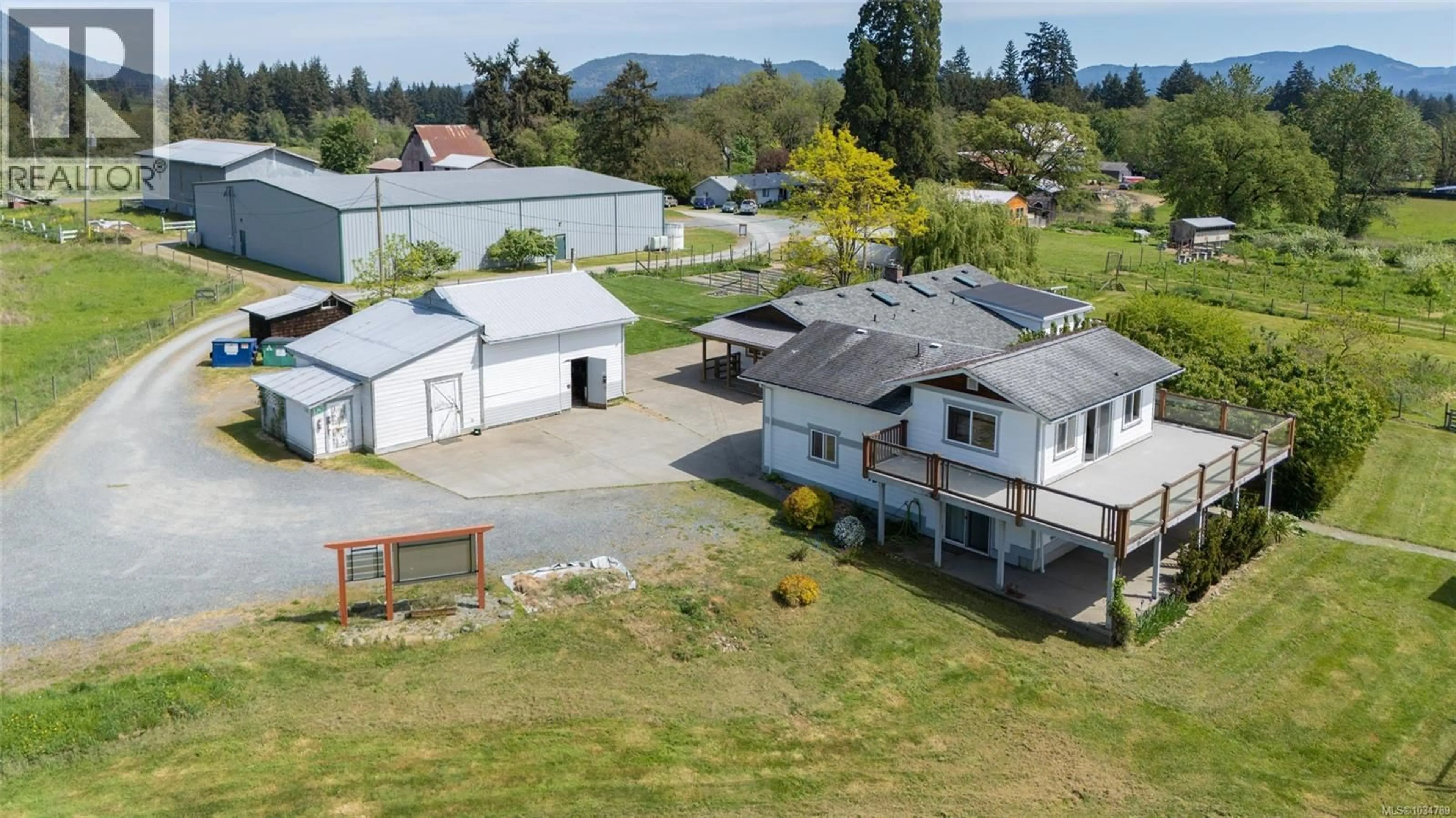 A pic from outside/outdoor area/front of a property/back of a property/a pic from drone, mountain view for 3504 DRINKWATER ROAD, Duncan British Columbia V9L5Z2