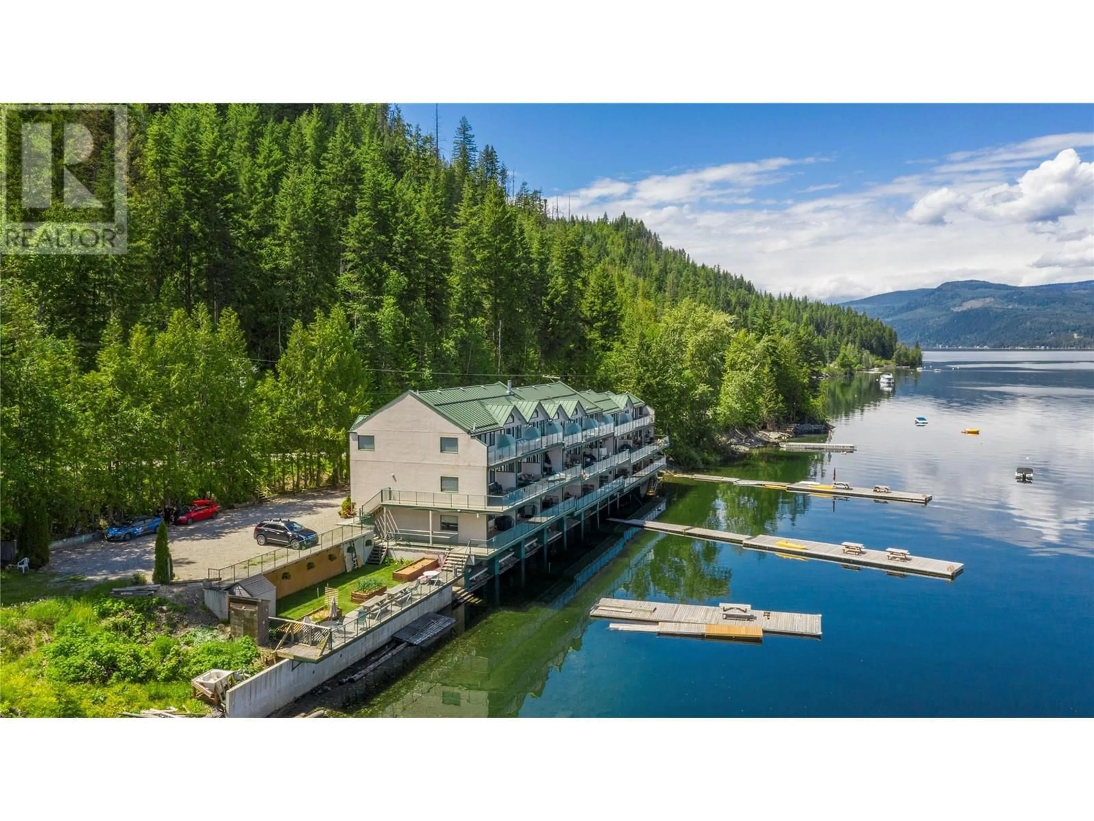 A pic from outside/outdoor area/front of a property/back of a property/a pic from drone, water/lake/river/ocean view for 7B - 3935 EAGLE BAY ROAD, Eagle Bay British Columbia V0E1T0