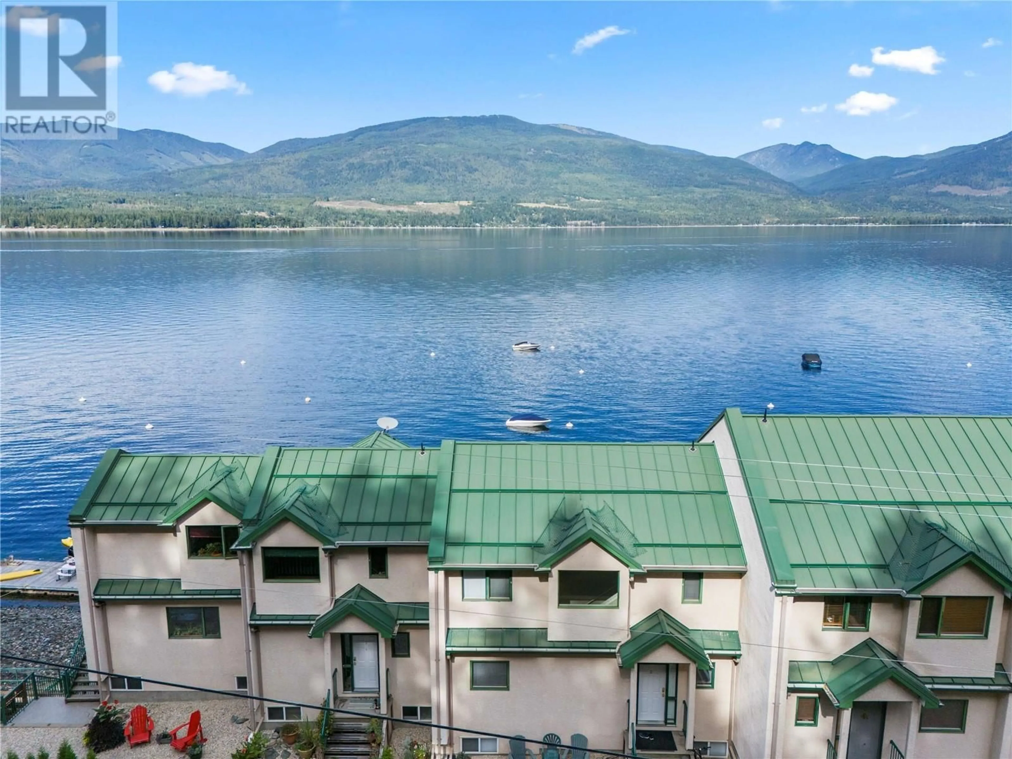 A pic from outside/outdoor area/front of a property/back of a property/a pic from drone, water/lake/river/ocean view for 7B - 3935 EAGLE BAY ROAD, Eagle Bay British Columbia V0E1T0