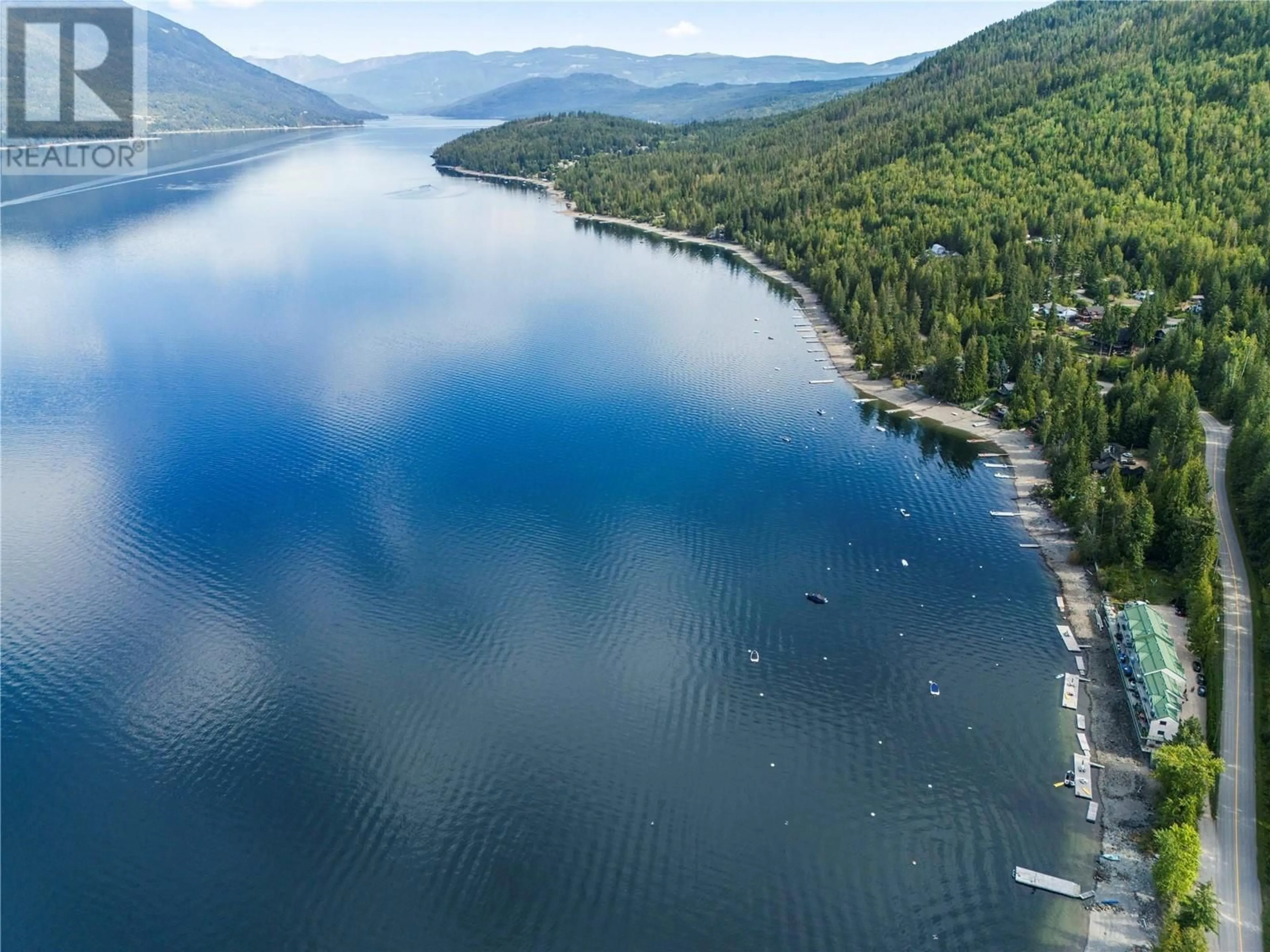 A pic from outside/outdoor area/front of a property/back of a property/a pic from drone, water/lake/river/ocean view for 7B - 3935 EAGLE BAY ROAD, Eagle Bay British Columbia V0E1T0