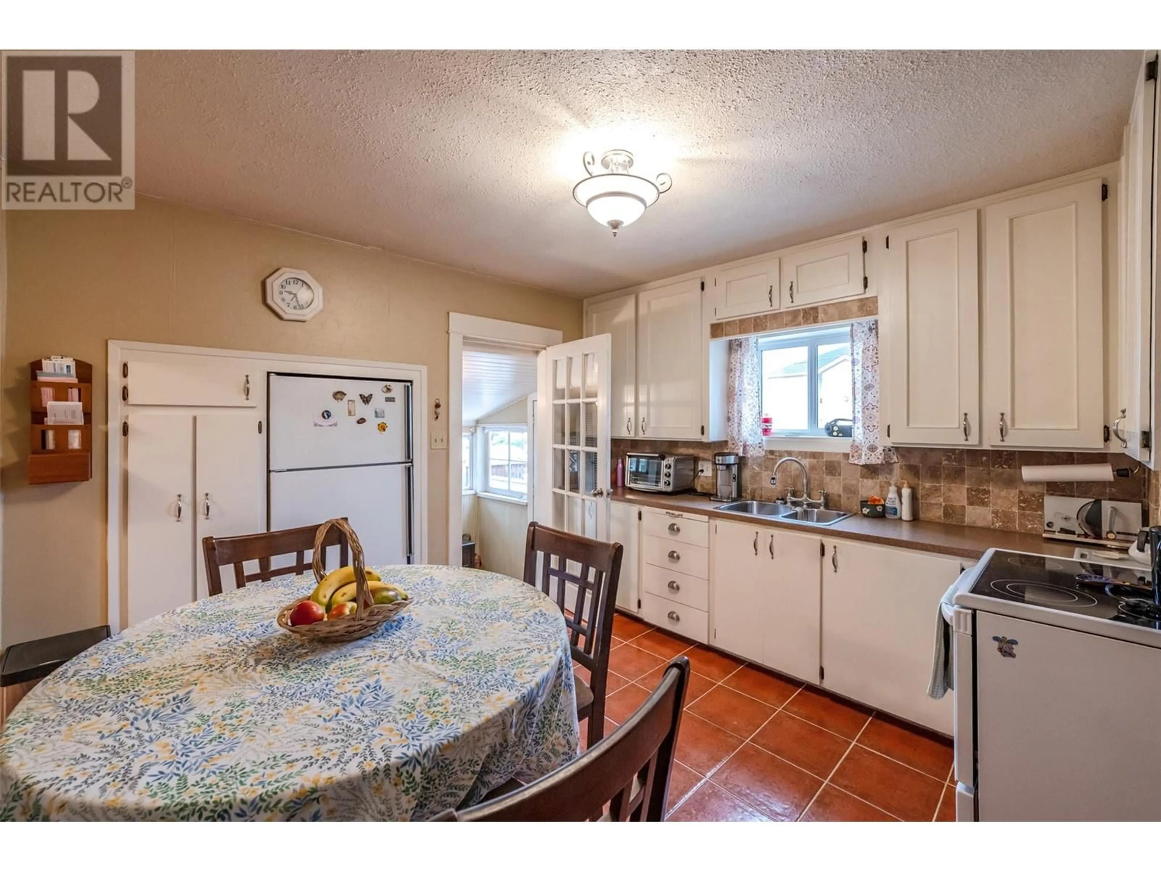Standard kitchen, ceramic/tile floor for 739 GOVERNMENT STREET, Penticton British Columbia V2A4T5