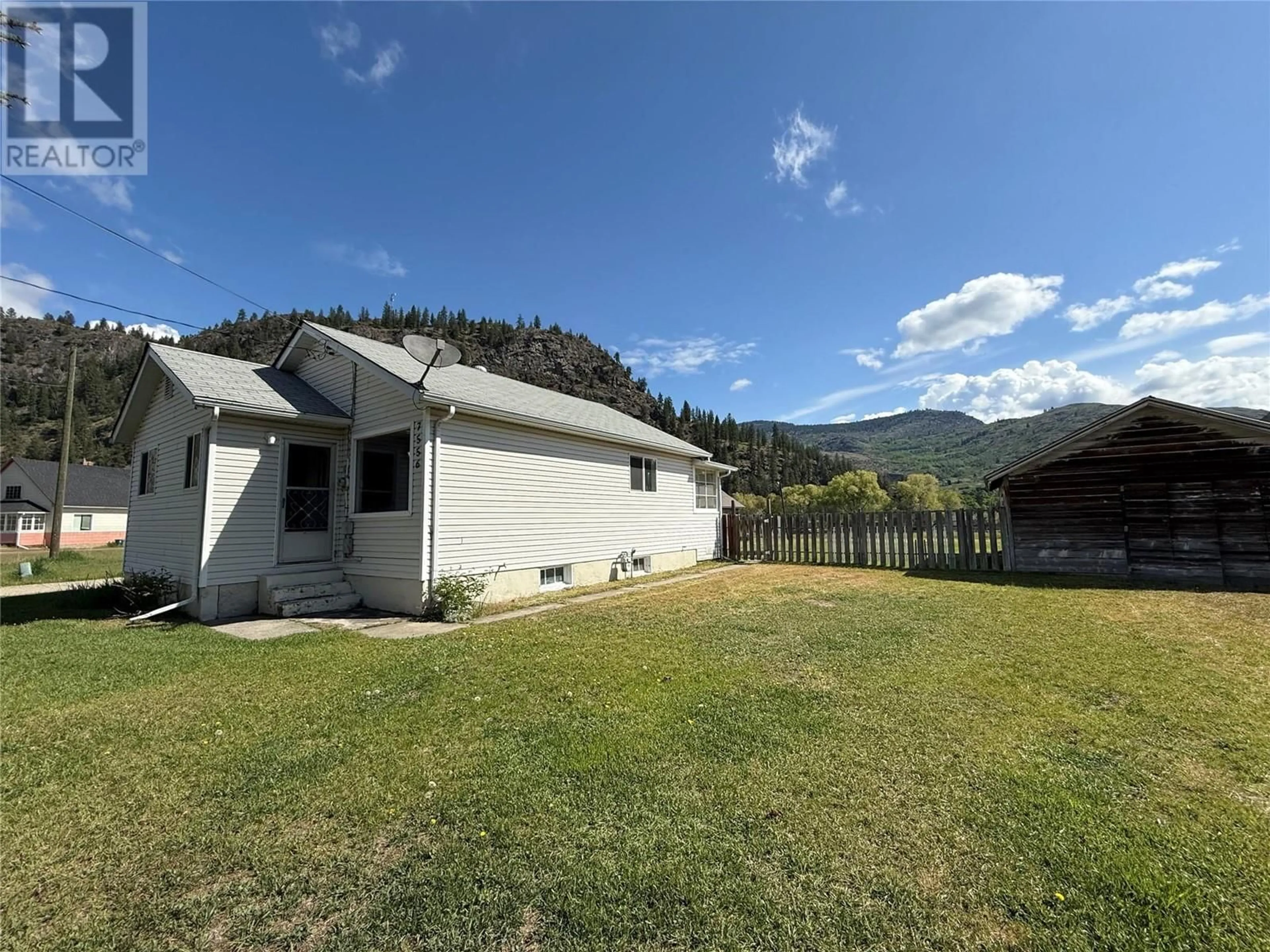 A pic from outside/outdoor area/front of a property/back of a property/a pic from drone, mountain view for 7556 10TH STREET, Grand Forks British Columbia V0H1H0