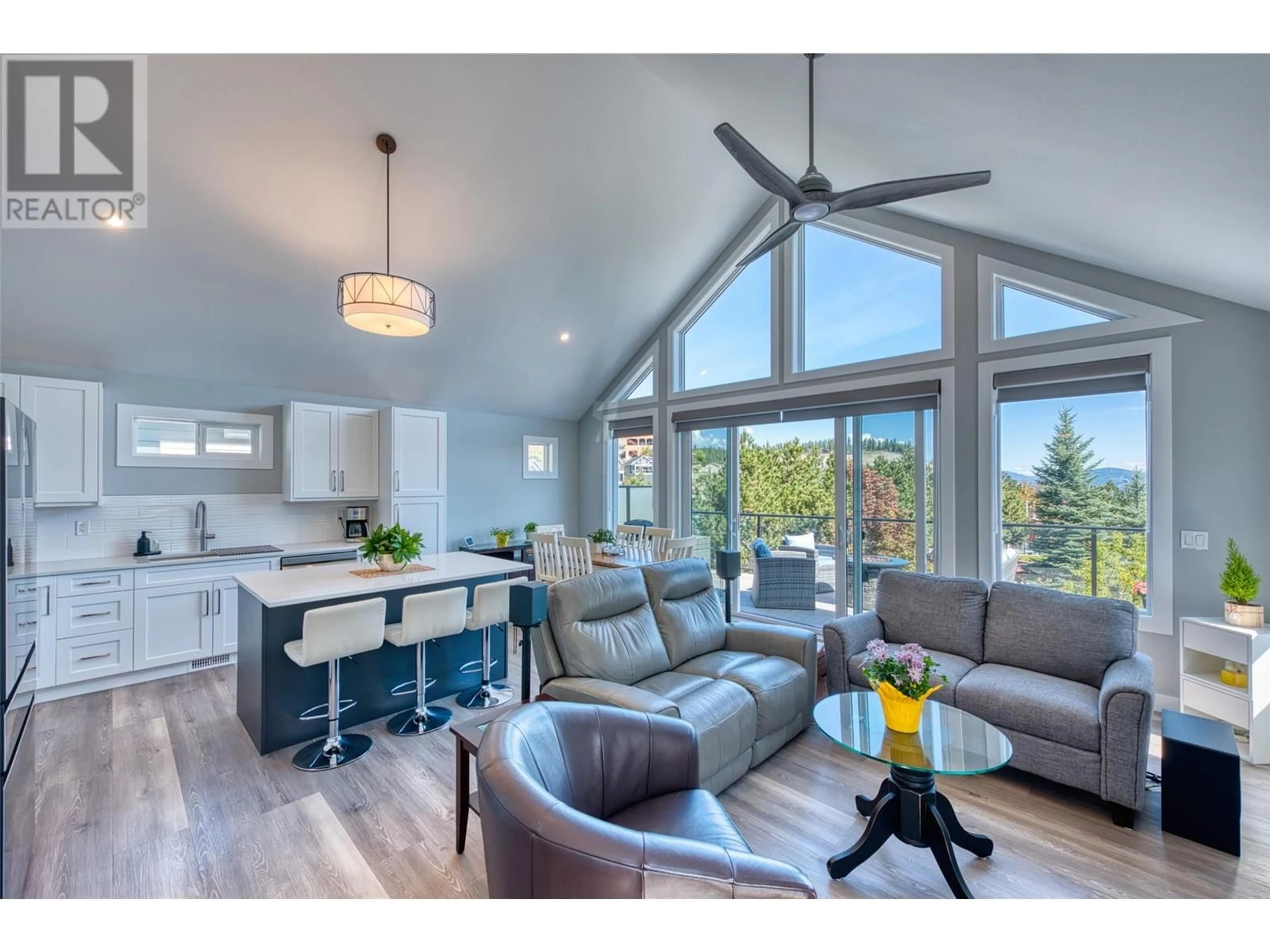 Open concept kitchen, wood/laminate floor for 348 - 6833 MADRID WAY, Kelowna British Columbia V1Z3R8