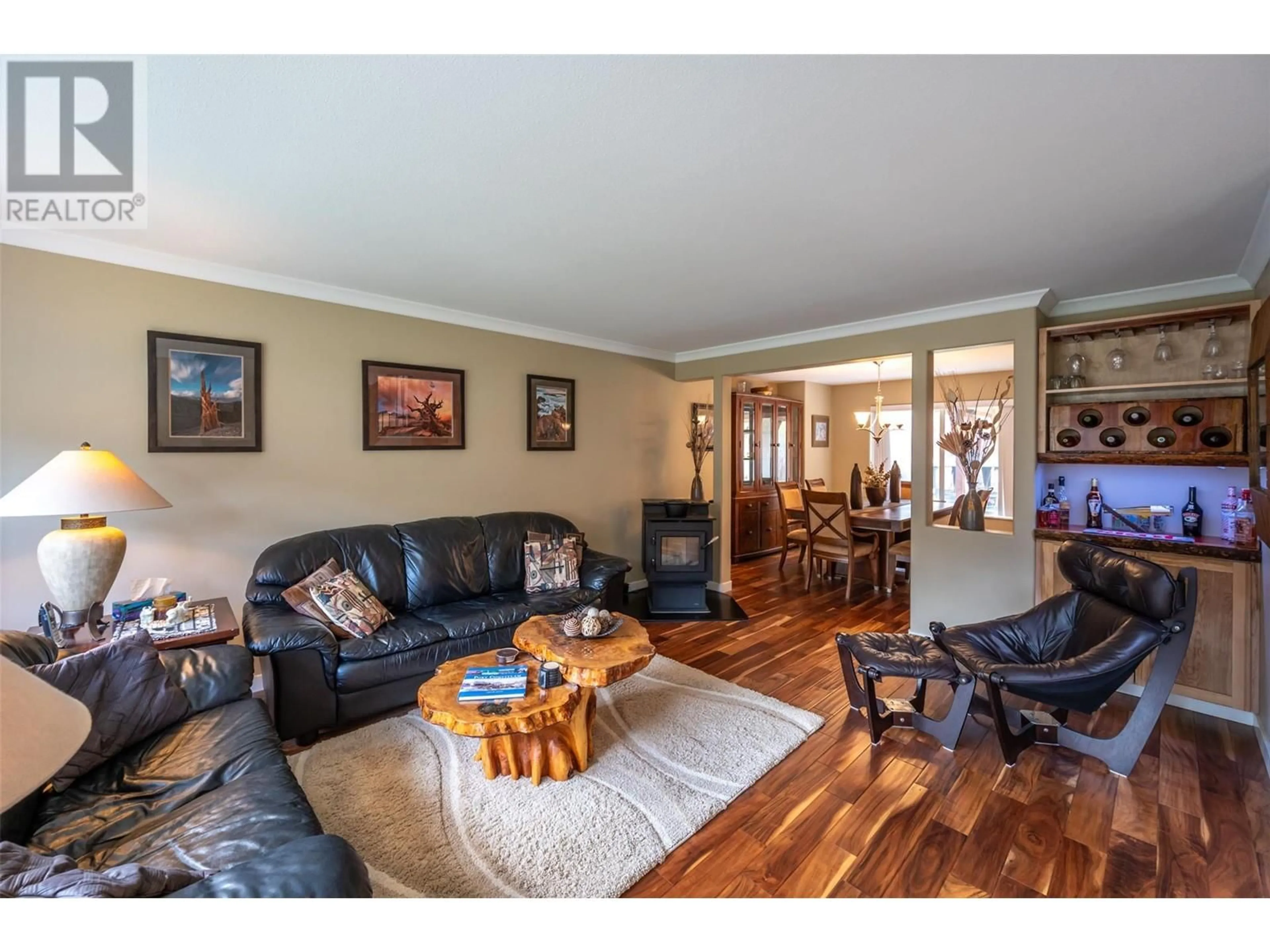 Living room with furniture, wood/laminate floor for 16612 GARNET VALLEY ROAD, Summerland British Columbia V0H1Z3