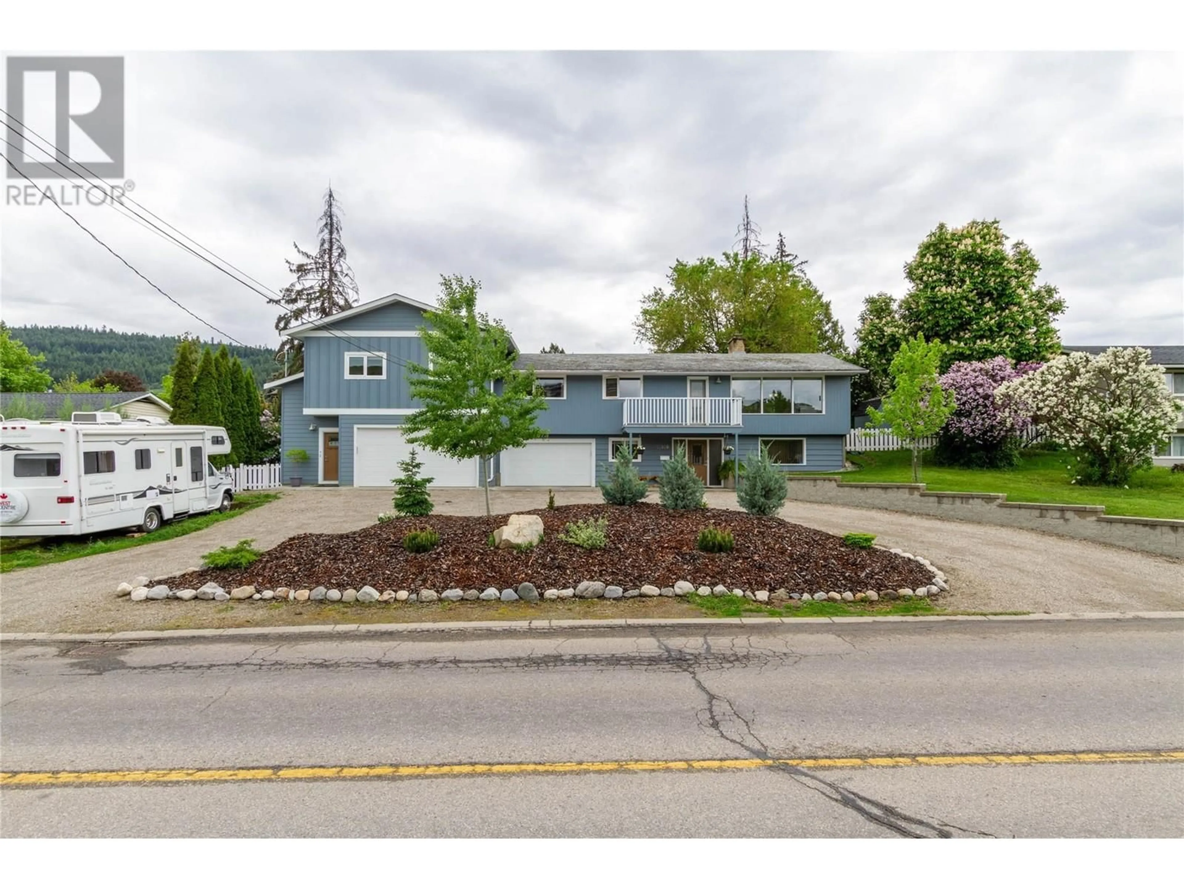 A pic from outside/outdoor area/front of a property/back of a property/a pic from drone, street for 11810 KIDSTON ROAD, Coldstream British Columbia V1B1S6