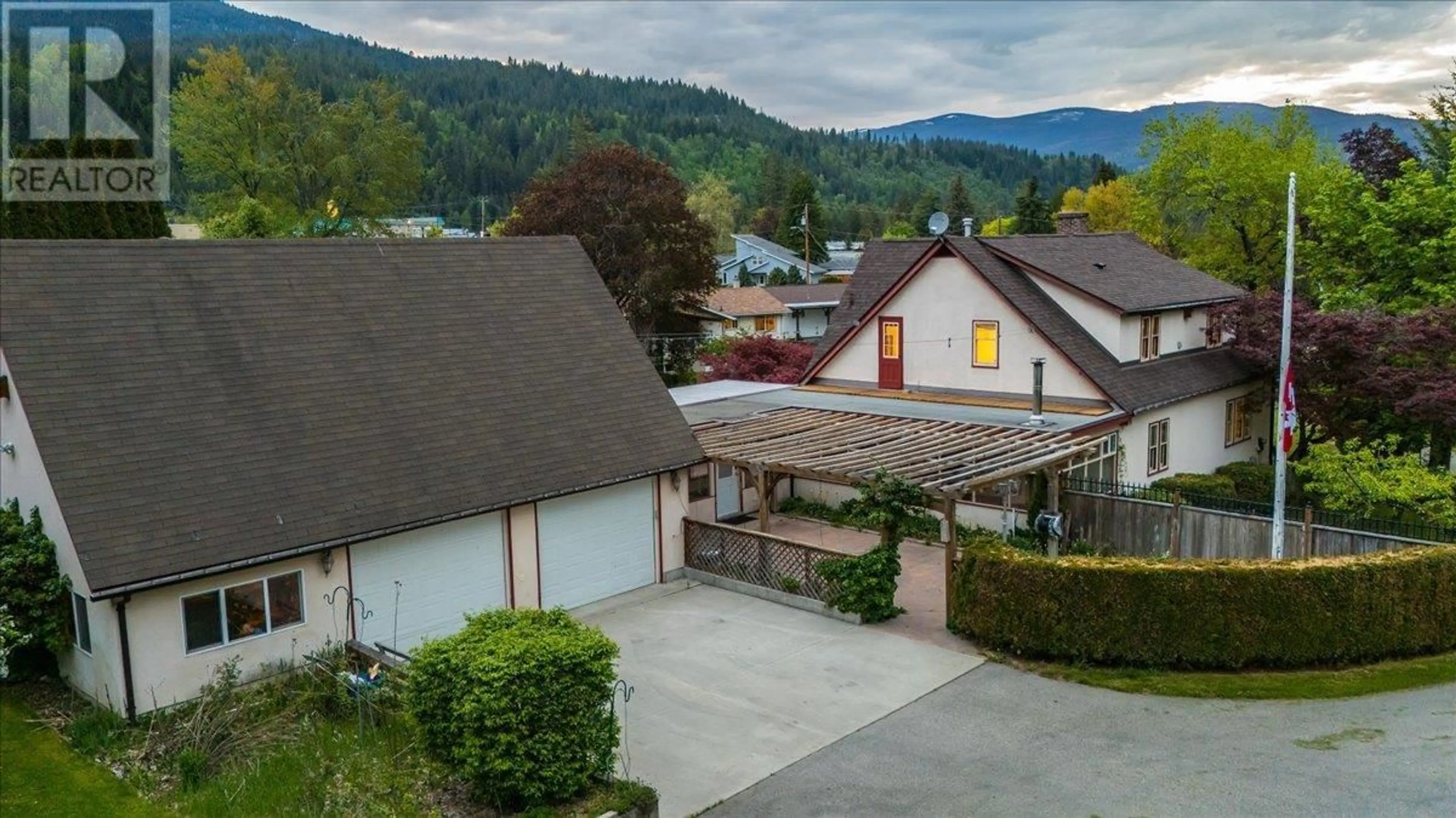 A pic from outside/outdoor area/front of a property/back of a property/a pic from drone, mountain view for 102 18TH STREET, Castlegar British Columbia V1N2M7