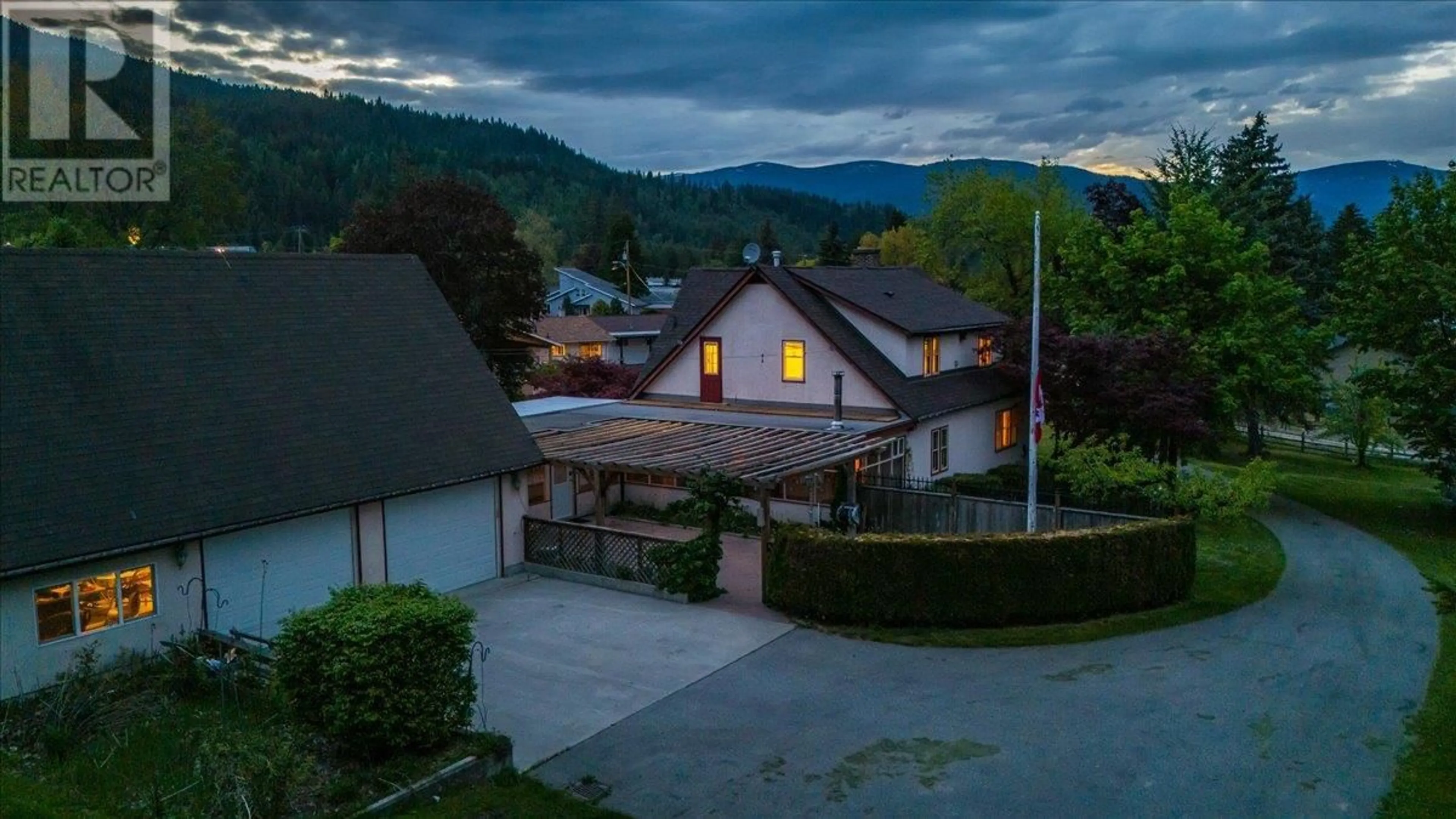 A pic from outside/outdoor area/front of a property/back of a property/a pic from drone, mountain view for 102 18TH STREET, Castlegar British Columbia V1N2M7