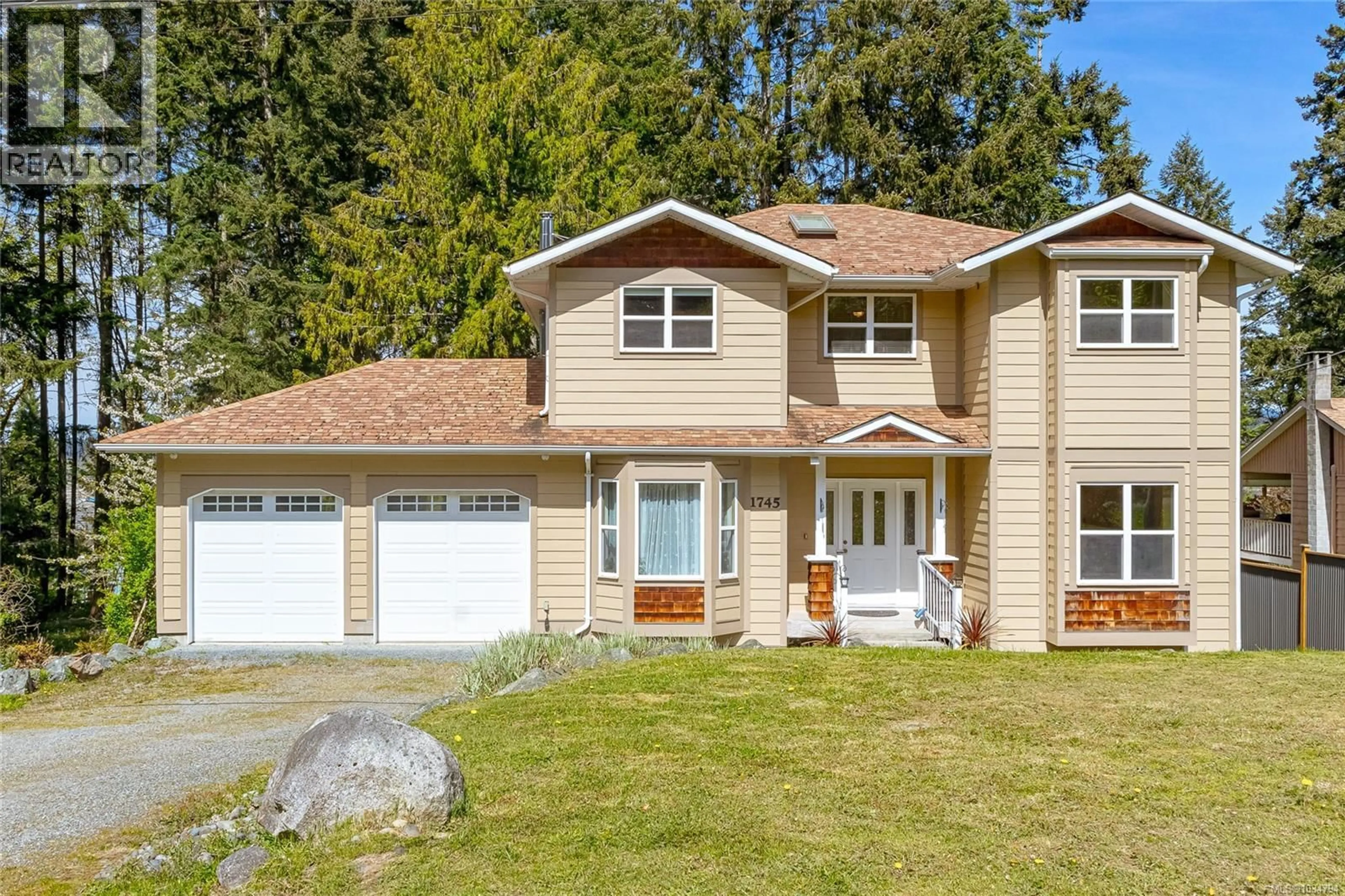 Home with vinyl exterior material, street for 1745 PAVENHAM ROAD, Cowichan Bay British Columbia V0R1N1
