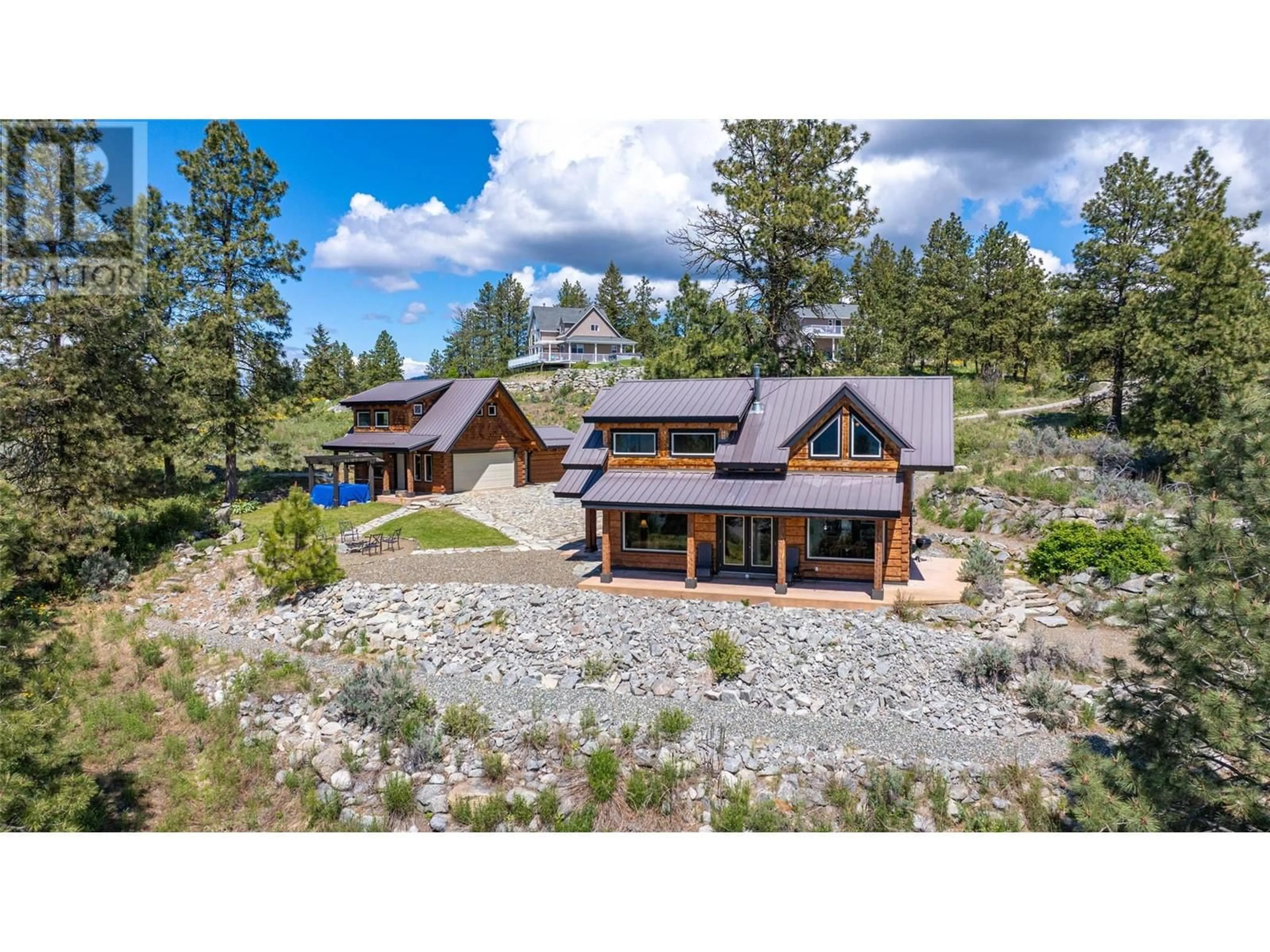 A pic from outside/outdoor area/front of a property/back of a property/a pic from drone, mountain view for 137 CARIBOU POINT, Osoyoos British Columbia V0H1V6