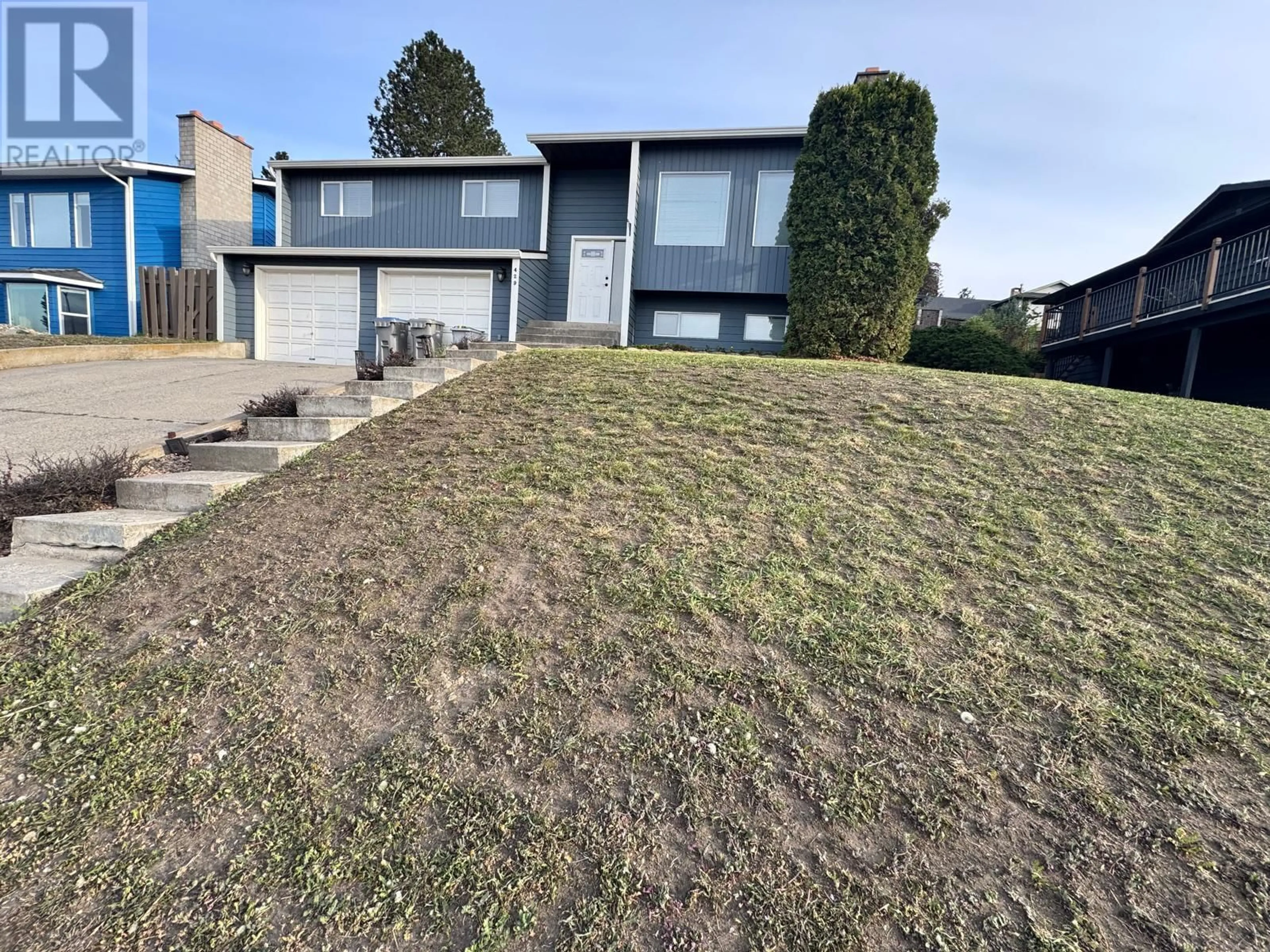 A pic from outside/outdoor area/front of a property/back of a property/a pic from drone, unknown for 429 GLENEAGLES DRIVE, Kamloops British Columbia V2E1Y4