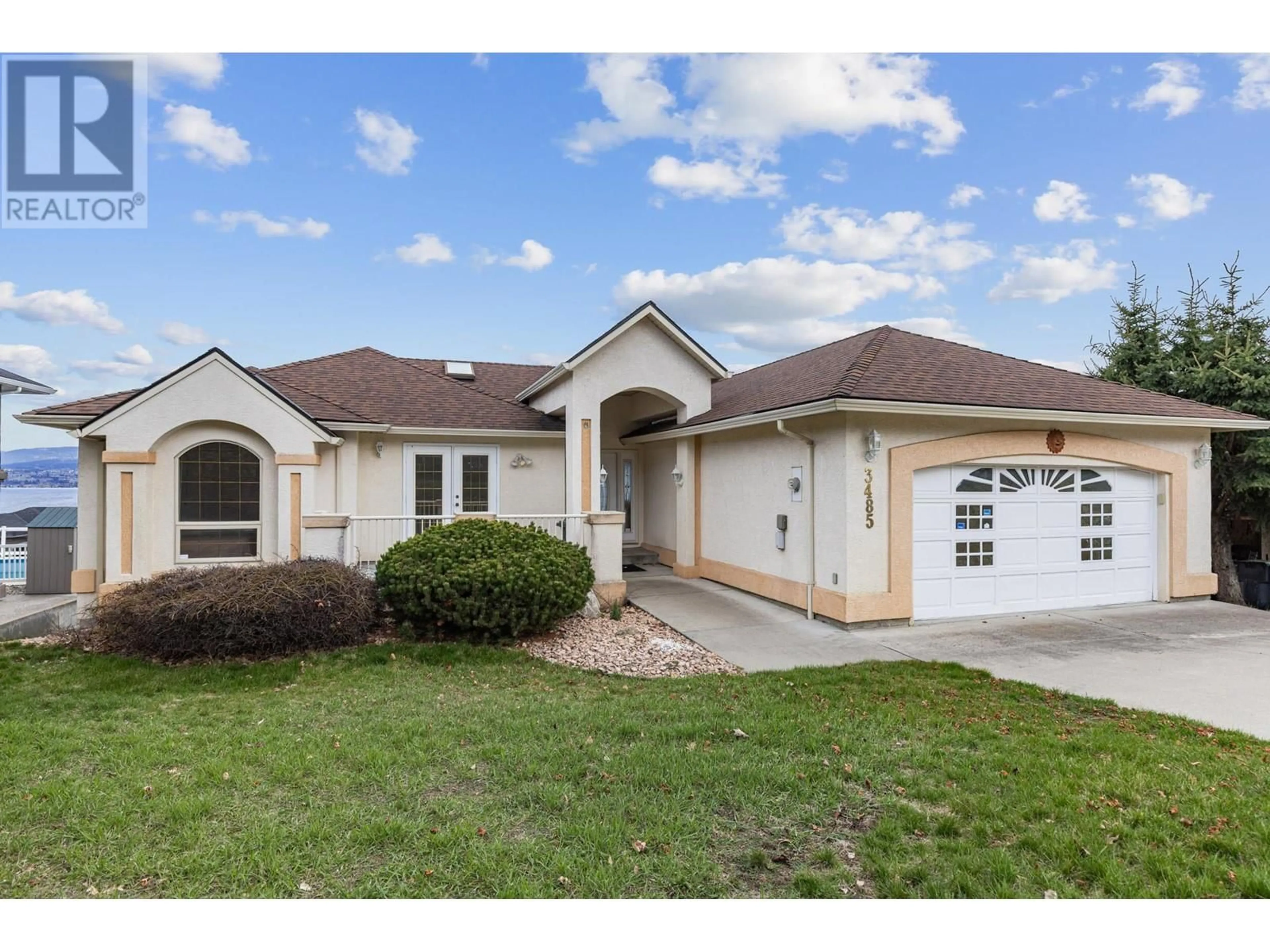 Home with vinyl exterior material, street for 3485 APPLE WAY BOULEVARD, West Kelowna British Columbia V4T1Y5