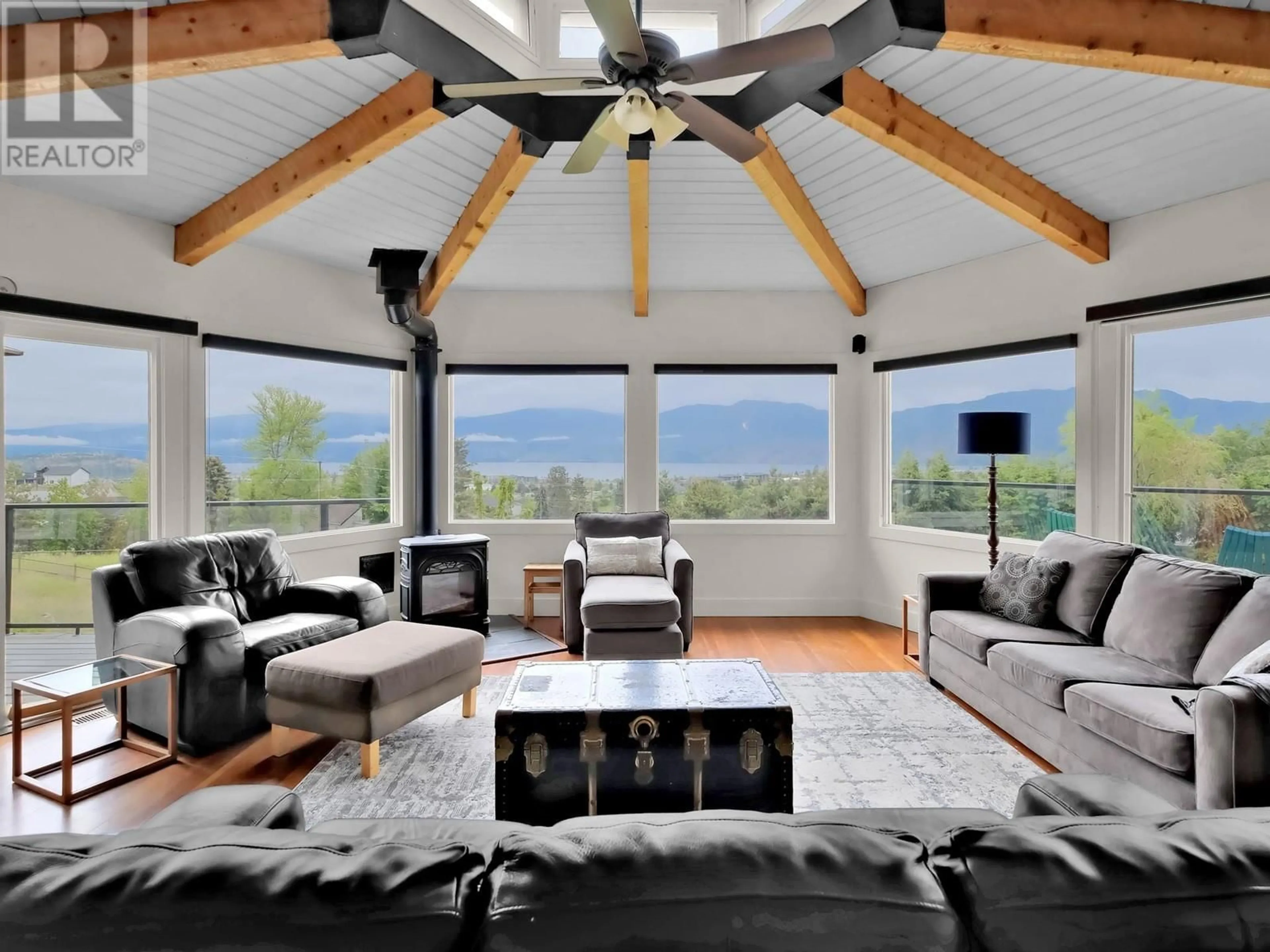 Living room with furniture, wood/laminate floor for 2630 RUFLI ROAD, West Kelowna British Columbia V4T1R3