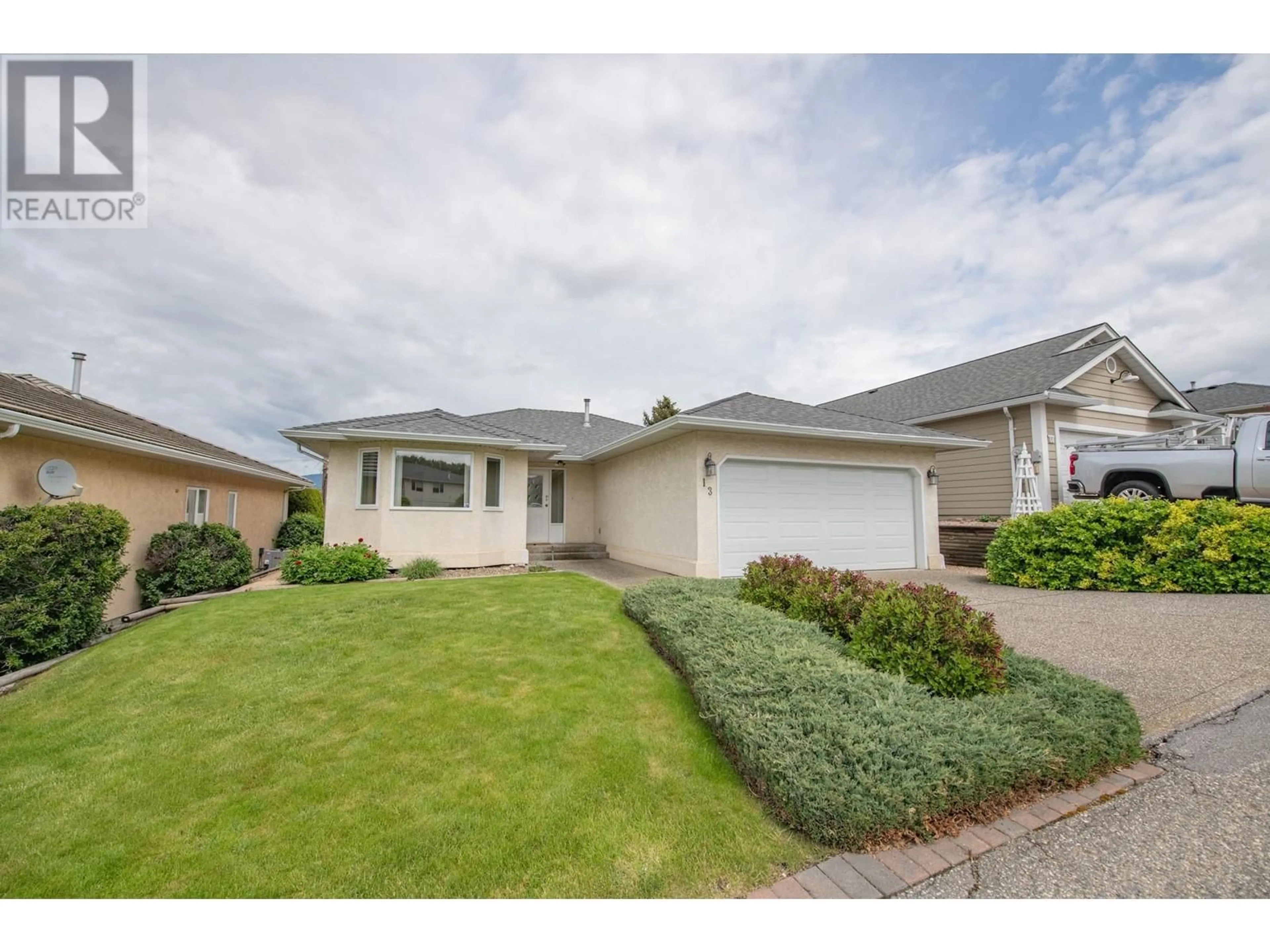 Home with vinyl exterior material, street for 13 - 124 SARSONS ROAD, Vernon British Columbia V1B2T9