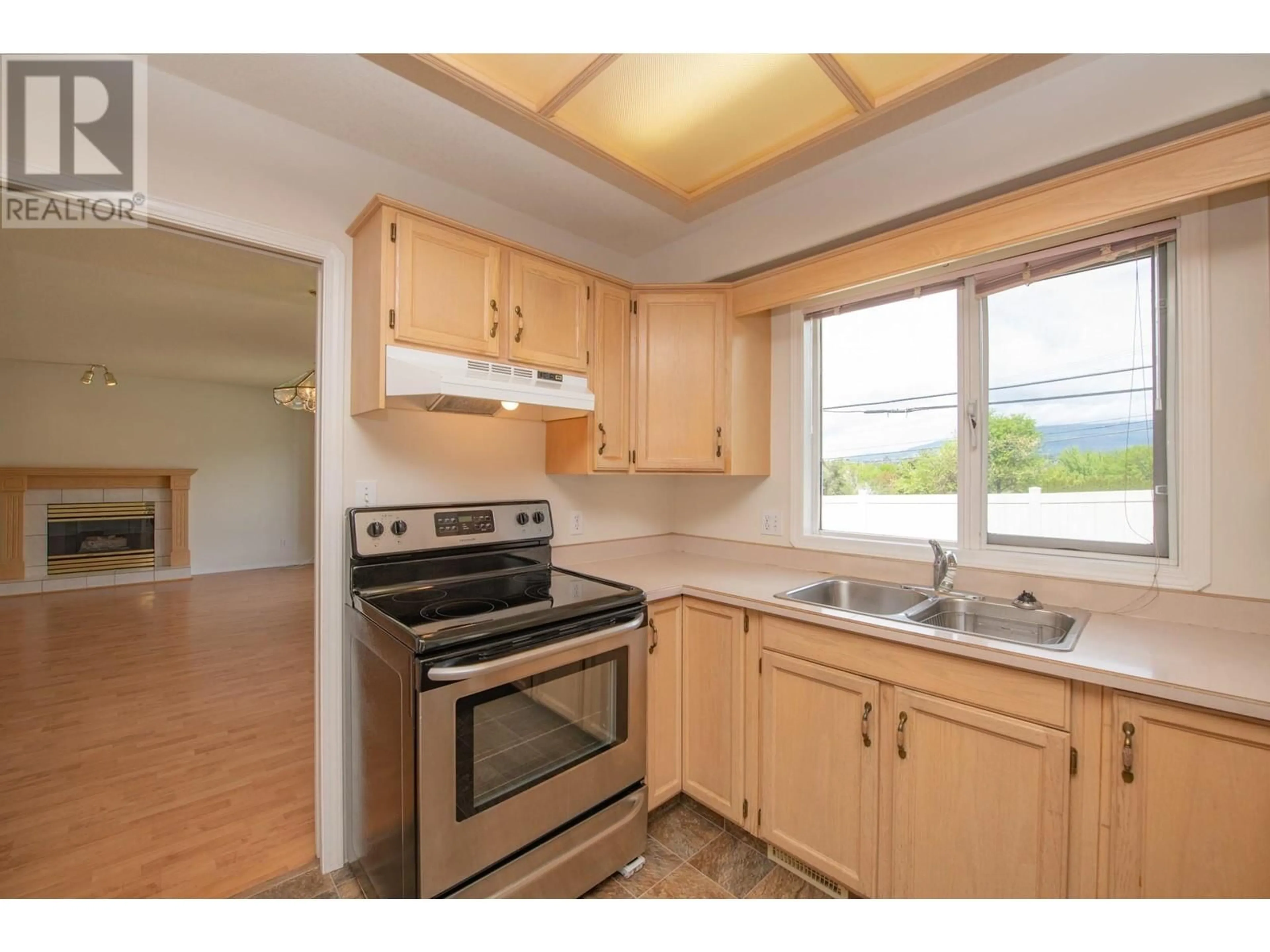 Standard kitchen, wood/laminate floor for 13 - 124 SARSONS ROAD, Vernon British Columbia V1B2T9