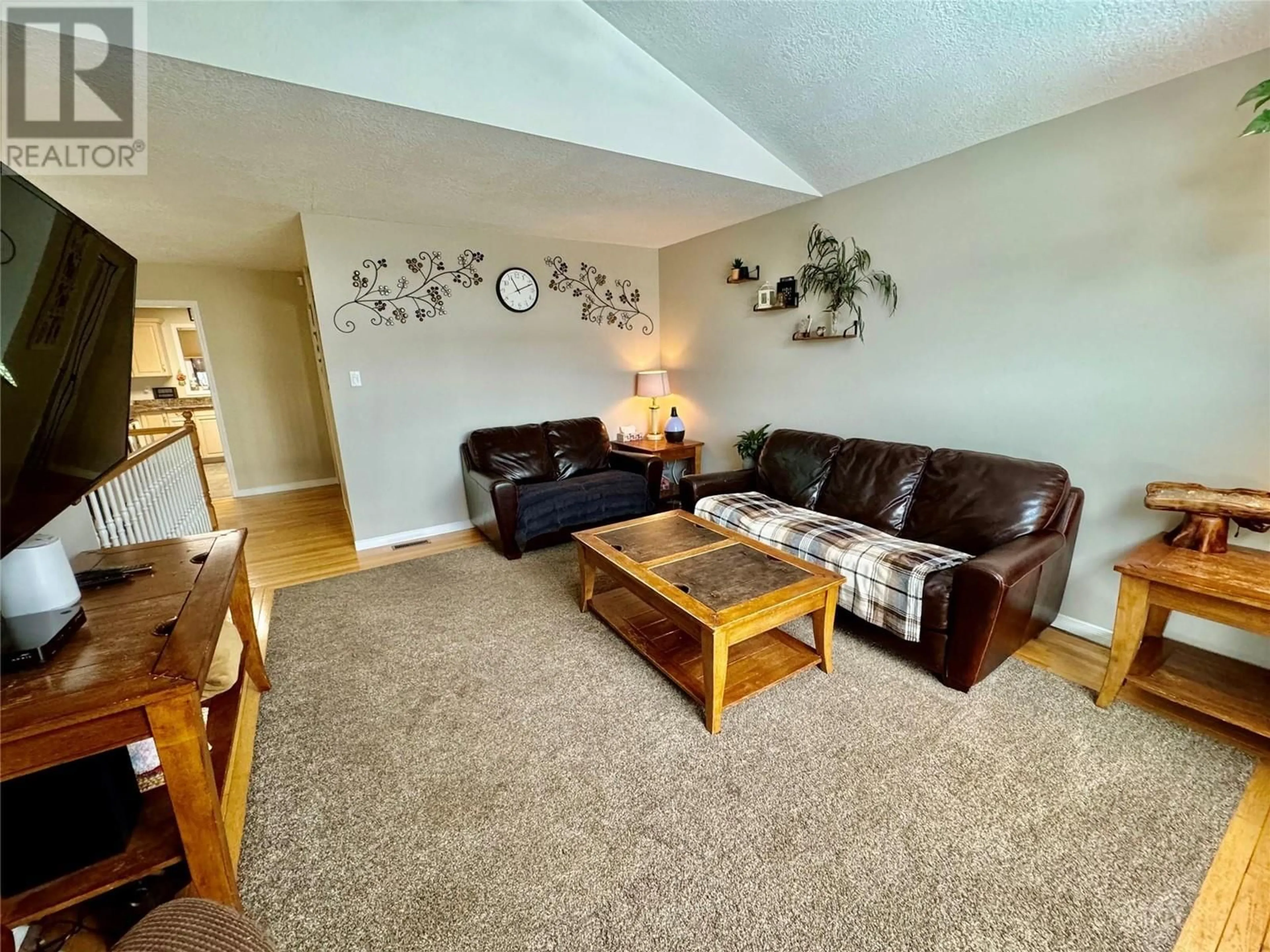 Living room with furniture, carpet floor for 2013 87A AVENUE, Dawson Creek British Columbia V1G4W5