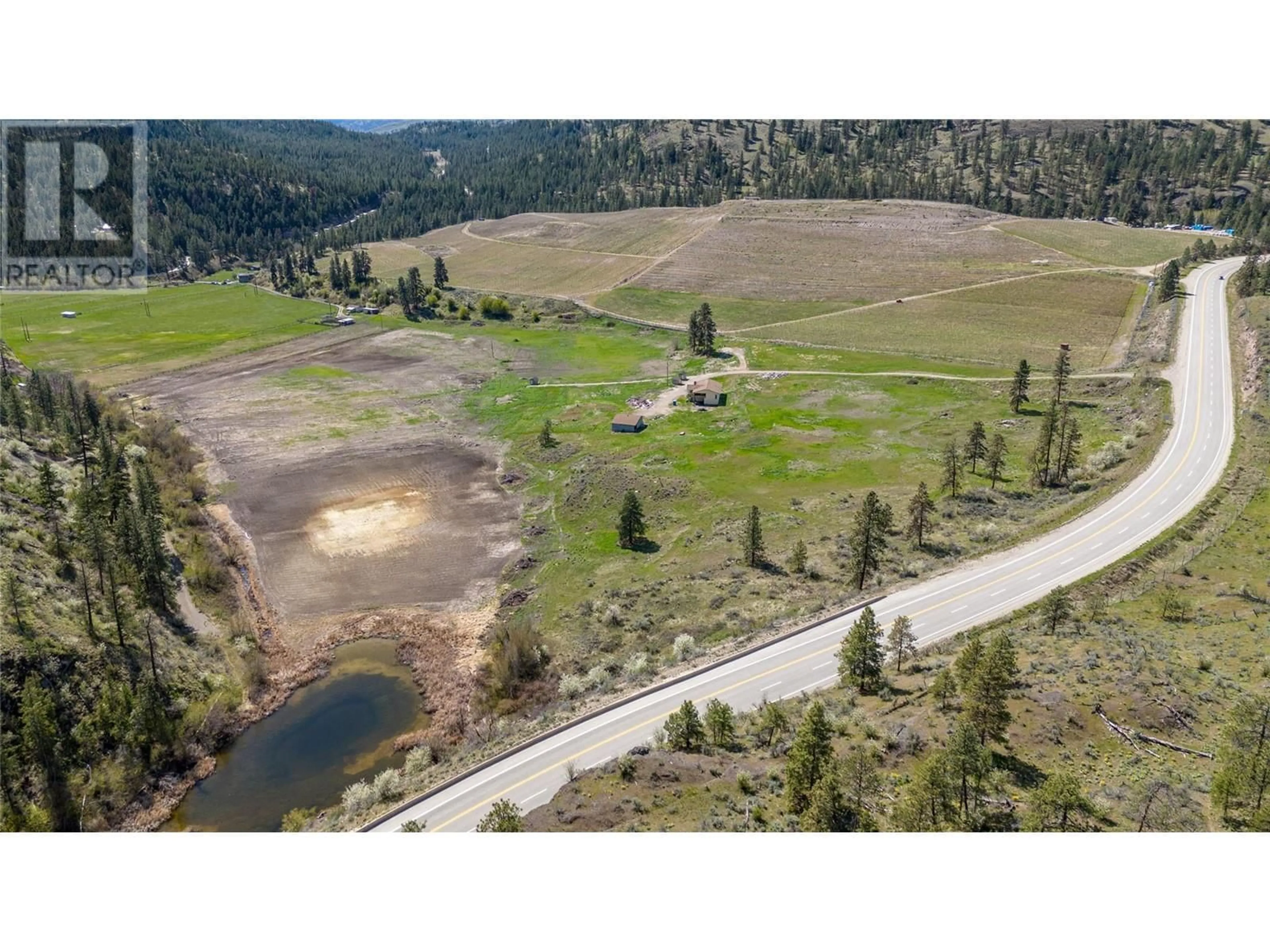 A pic from outside/outdoor area/front of a property/back of a property/a pic from drone, mountain view for 101 HWY 3A HIGHWAY, Kaleden British Columbia V0H1K0