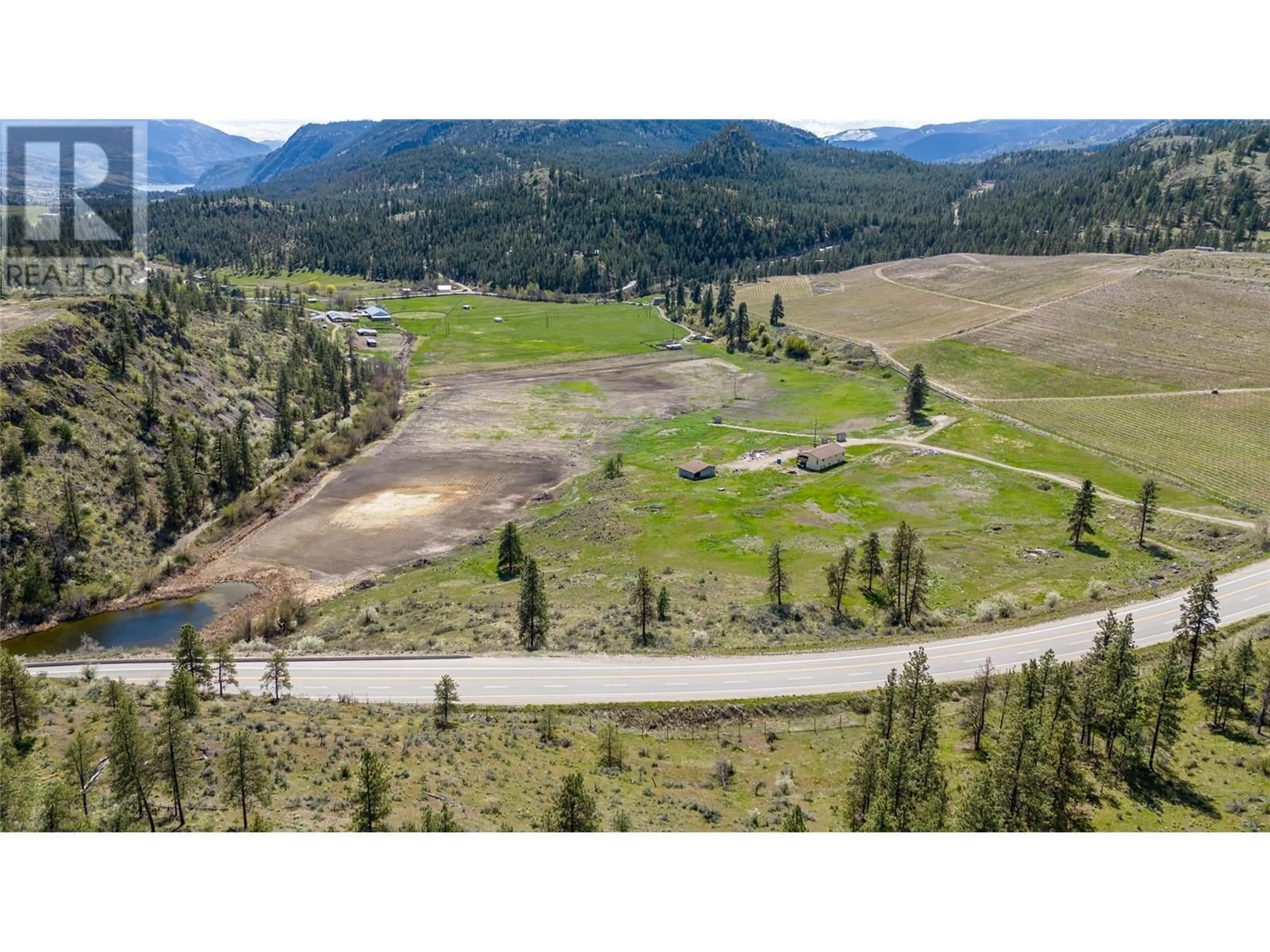 A pic from outside/outdoor area/front of a property/back of a property/a pic from drone, mountain view for 101 HWY 3A HIGHWAY, Kaleden British Columbia V0H1K0