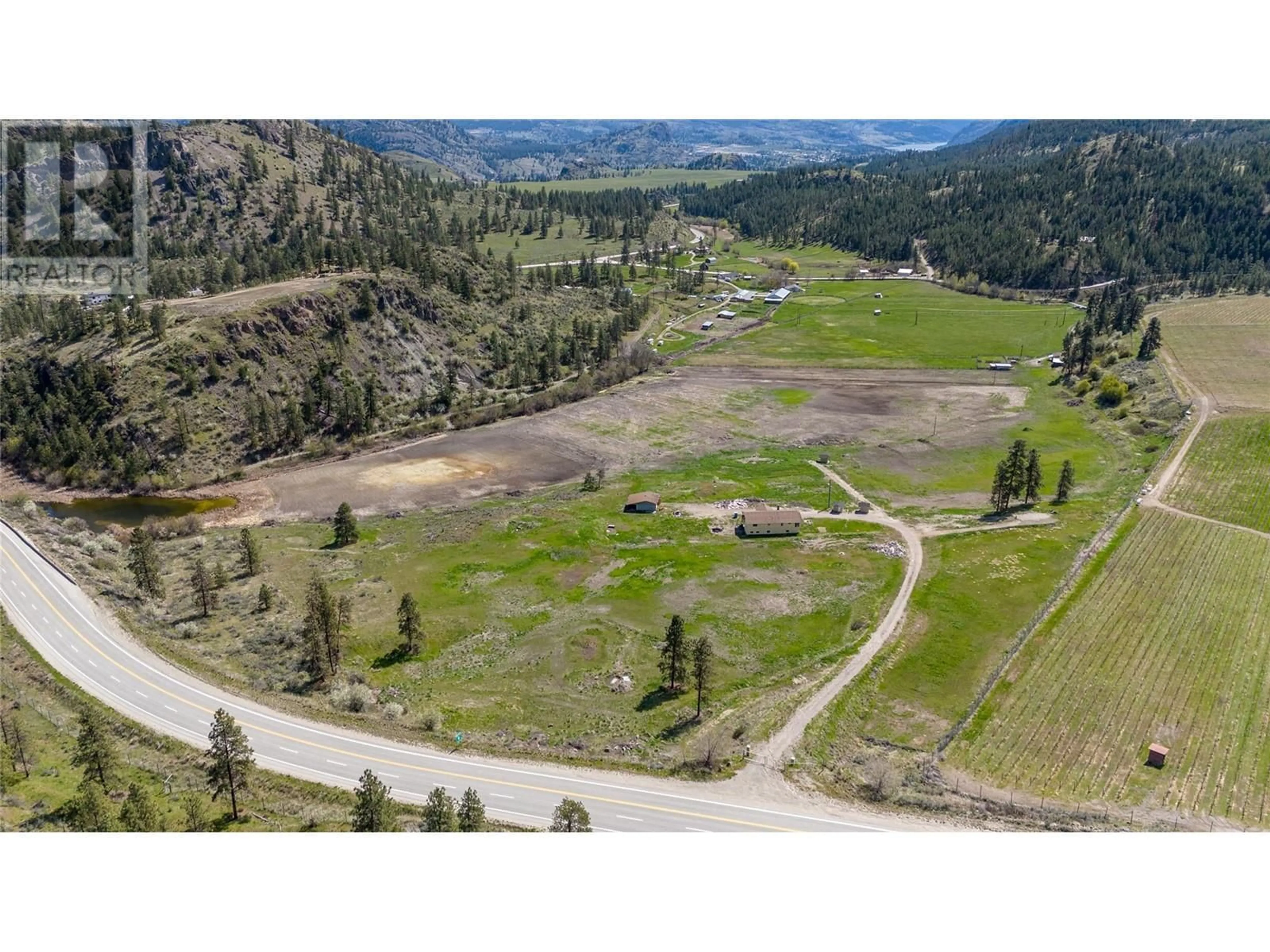 A pic from outside/outdoor area/front of a property/back of a property/a pic from drone, mountain view for 101 HWY 3A HIGHWAY, Kaleden British Columbia V0H1K0