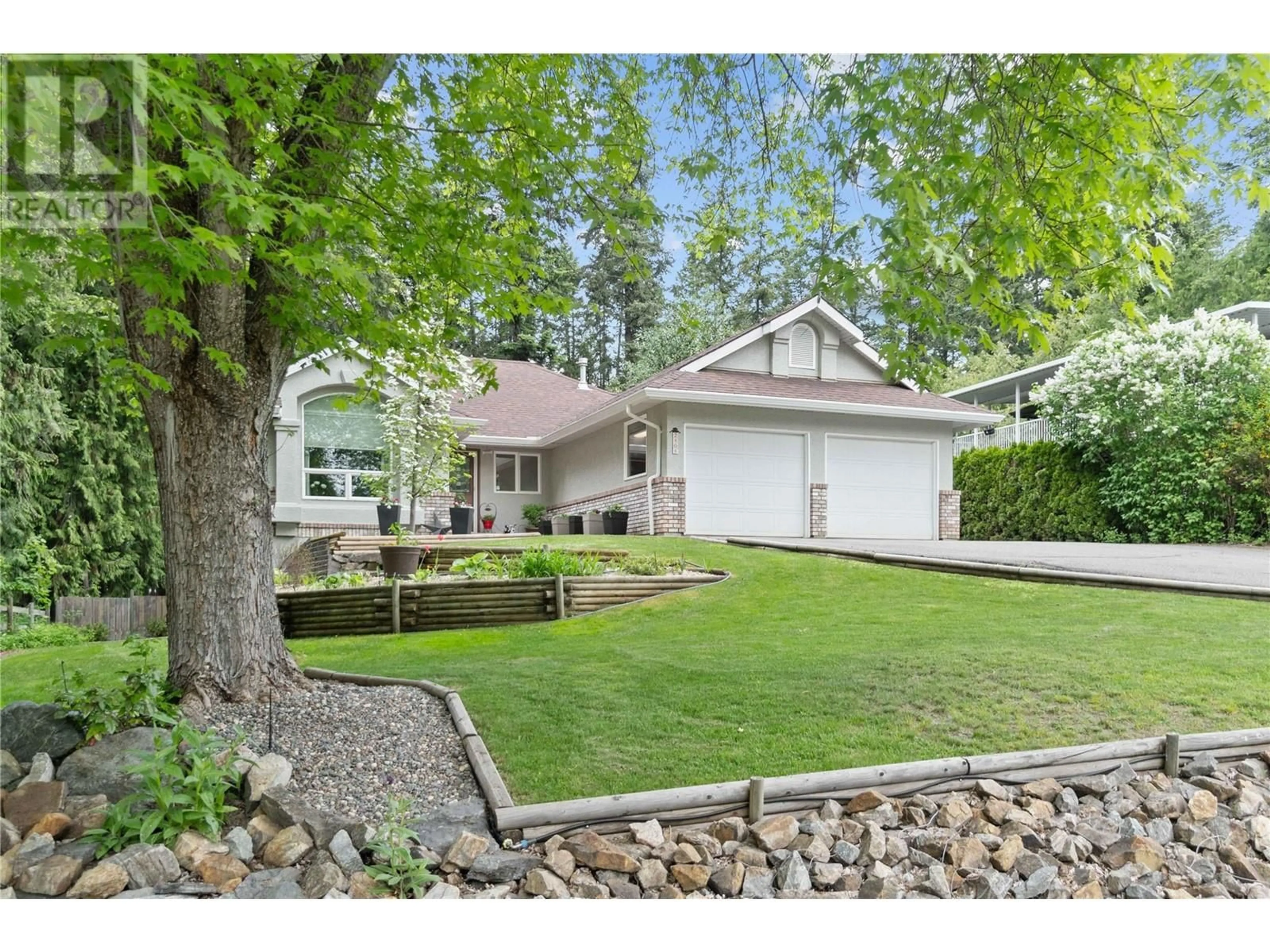 Home with vinyl exterior material, street for 2408 MOUNT TUAM CRESCENT, Sorrento British Columbia V0E2W2