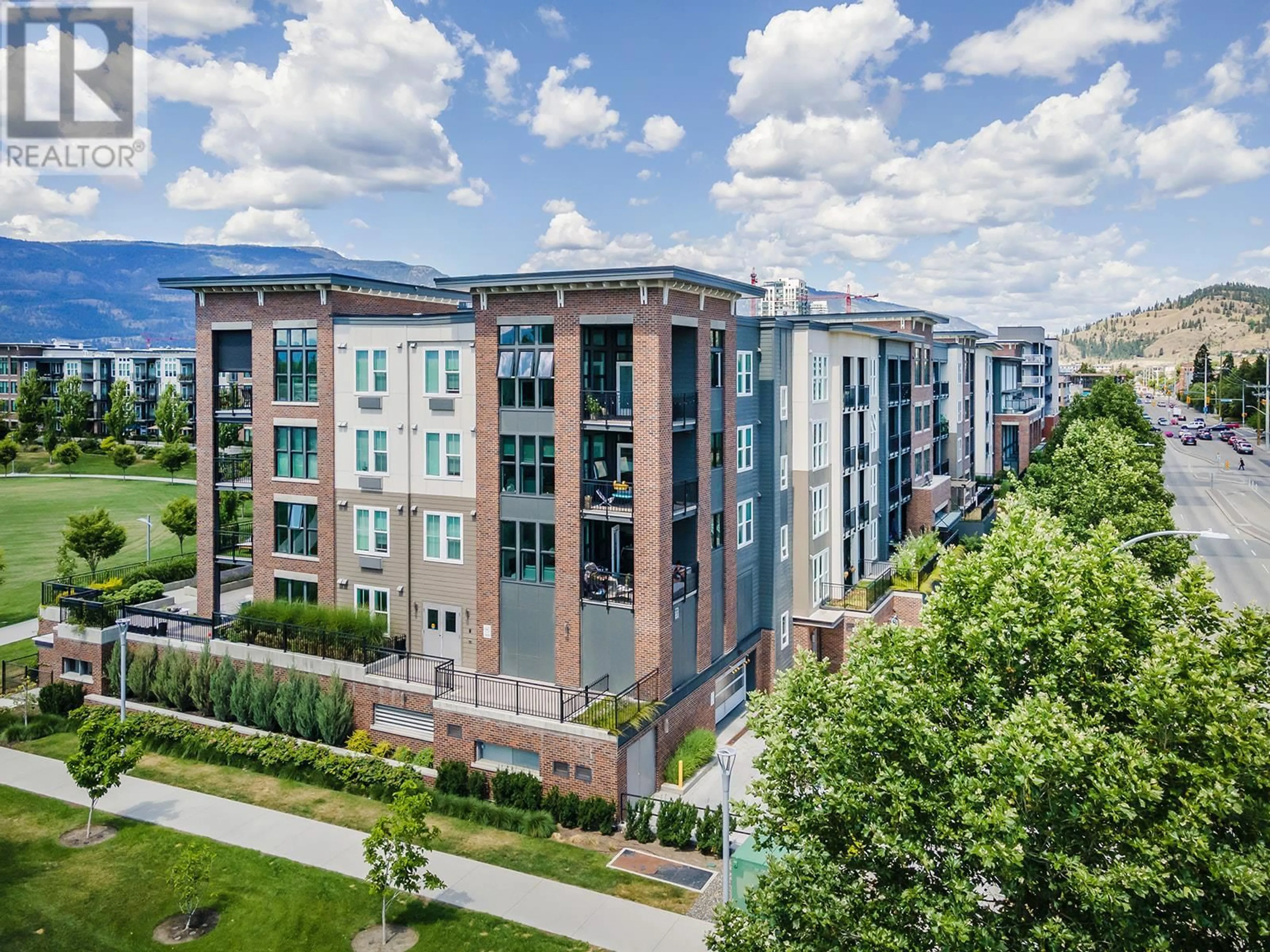 A pic from outside/outdoor area/front of a property/back of a property/a pic from drone, city buildings view from balcony for 208 - 1800 RICHTER STREET, Kelowna British Columbia V1Y0G9