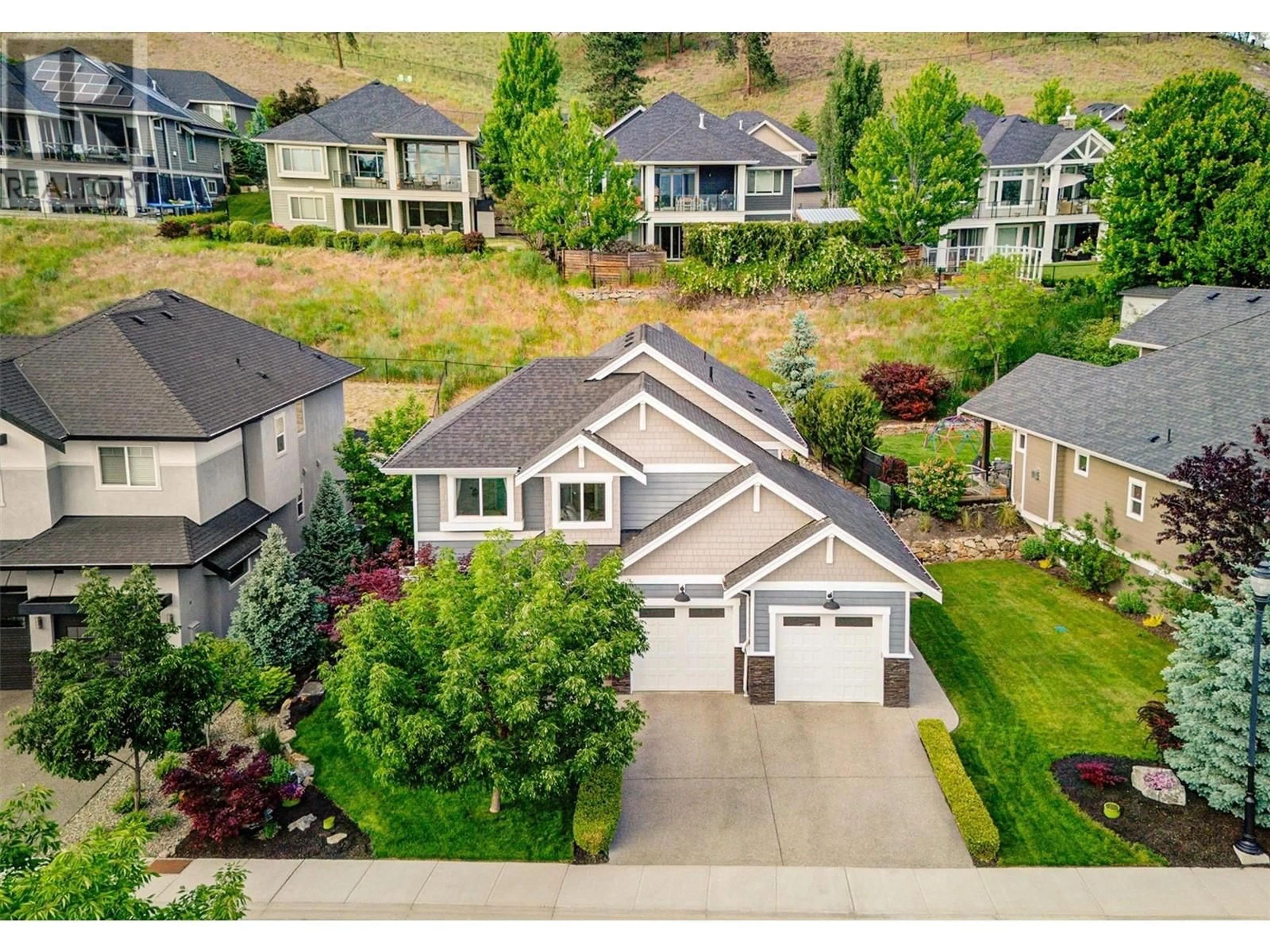 A pic from outside/outdoor area/front of a property/back of a property/a pic from drone, mountain view for 122 LOST CREEK COURT, Kelowna British Columbia V1V3B6