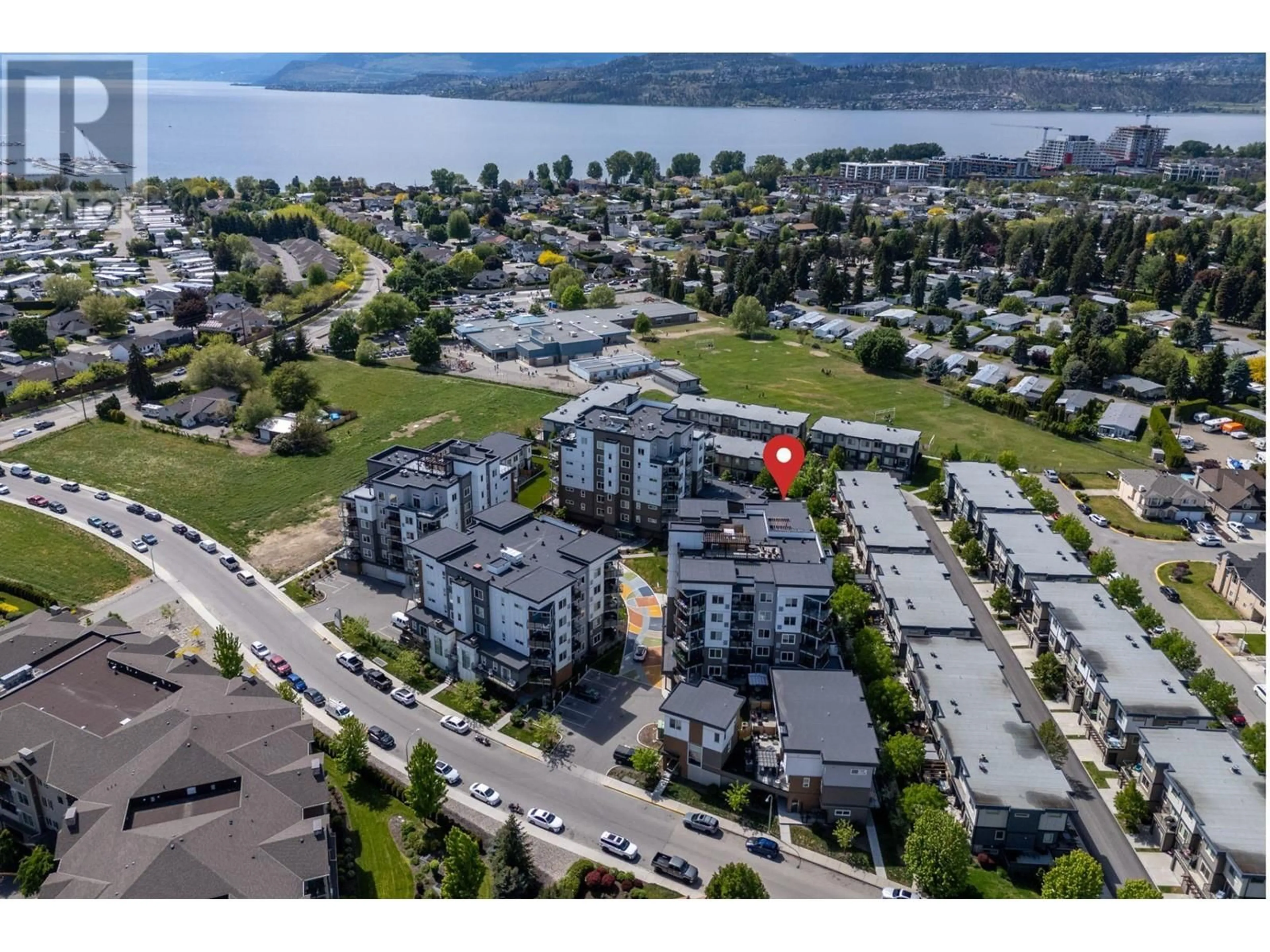 A pic from outside/outdoor area/front of a property/back of a property/a pic from drone, water/lake/river/ocean view for 604 - 3630 MISSION SPRINGS DRIVE, Kelowna British Columbia V1W0B2
