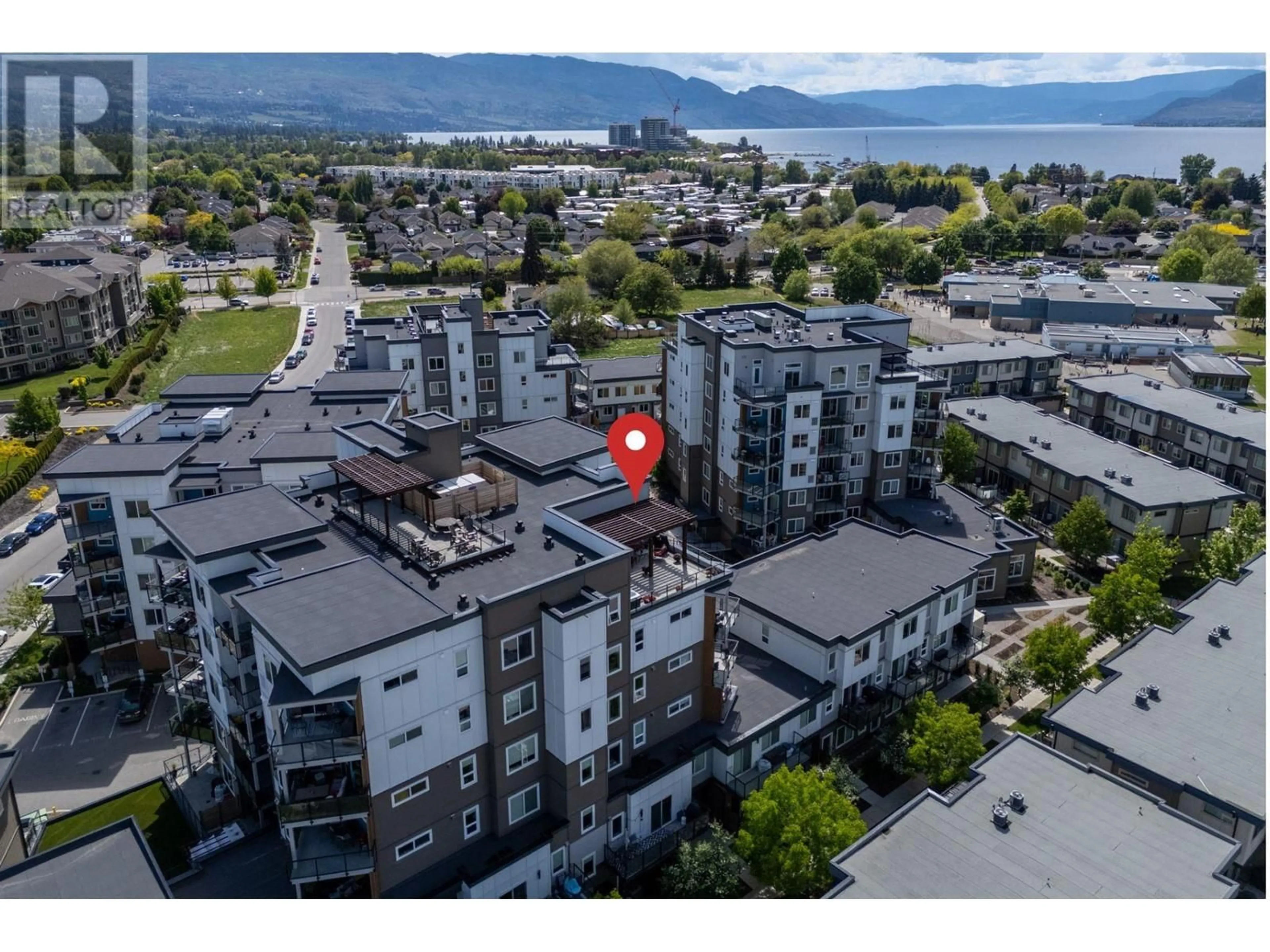 A pic from outside/outdoor area/front of a property/back of a property/a pic from drone, unknown for 604 - 3630 MISSION SPRINGS DRIVE, Kelowna British Columbia V1W0B2