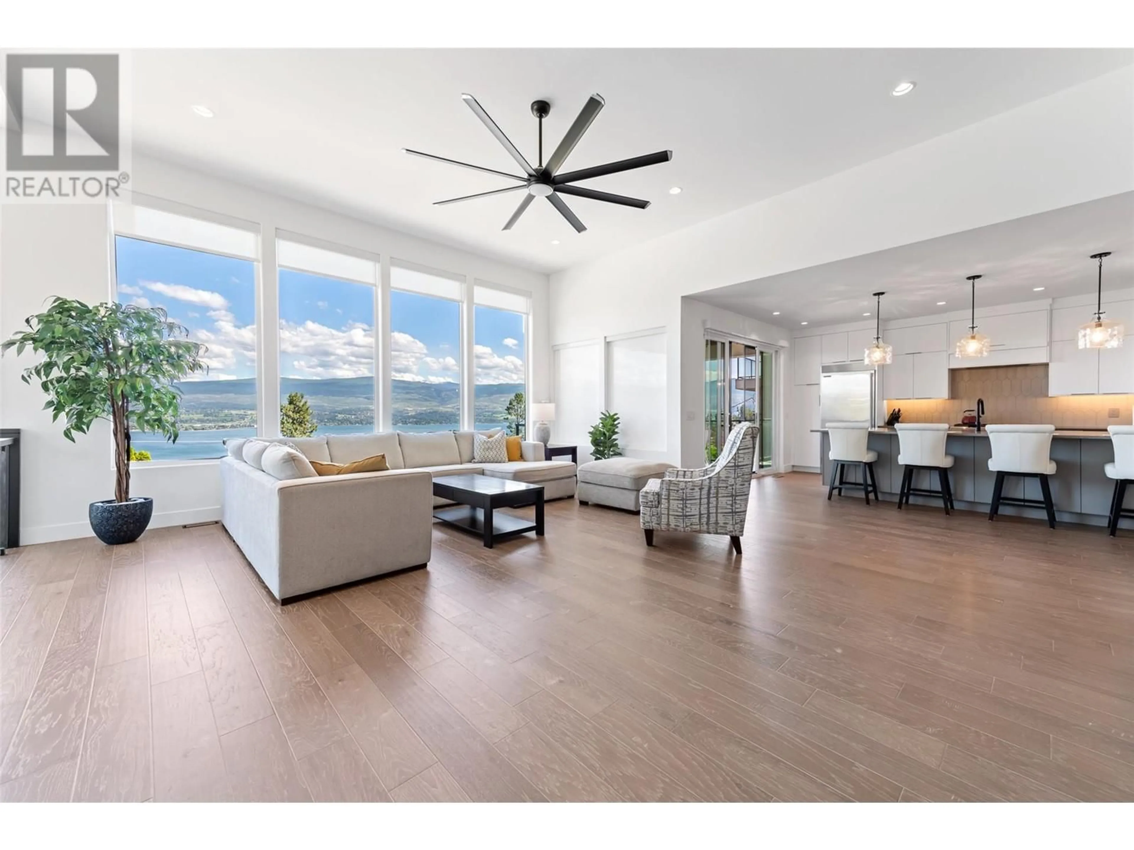 Living room with furniture, wood/laminate floor for 2672 LAKERIDGE ROAD, West Kelowna British Columbia V1Z1Y2