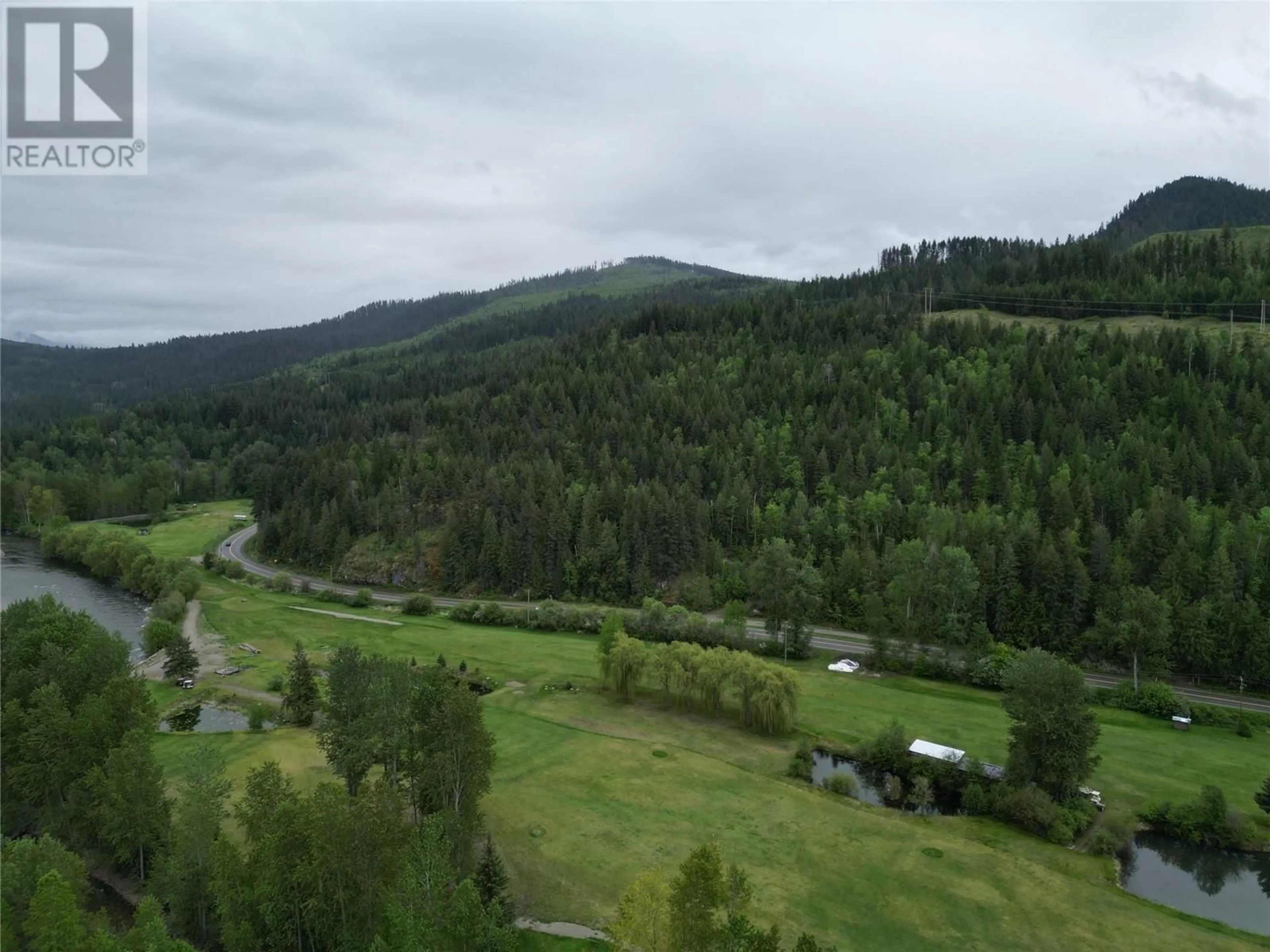 A pic from outside/outdoor area/front of a property/back of a property/a pic from drone, unknown for 1361 6 HIGHWAY, Cherryville British Columbia V0E2G1