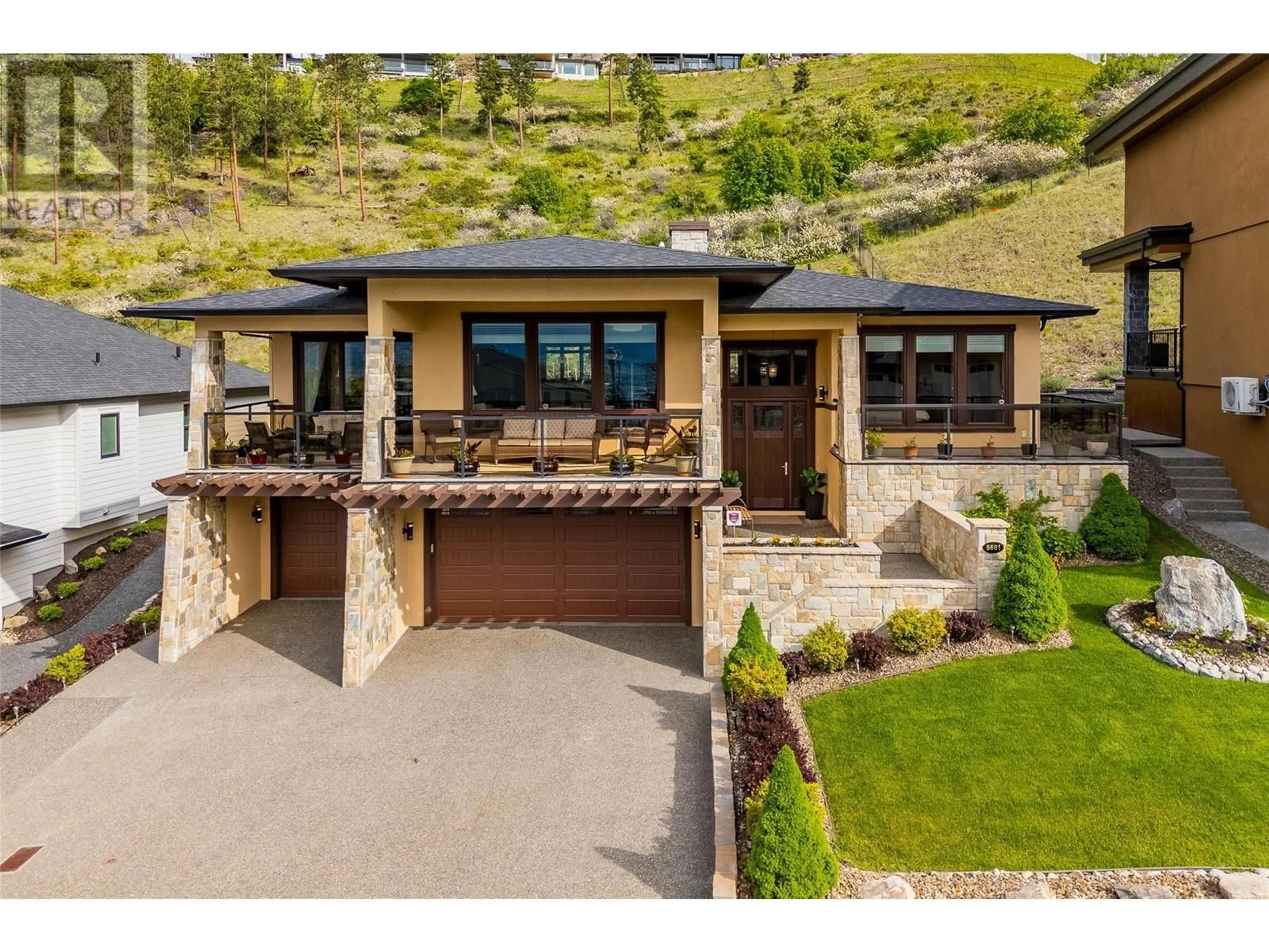 Home with brick exterior material, unknown for 5661 JASPER WAY, Kelowna British Columbia V1W5l7